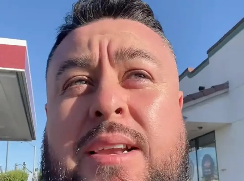 Eddie goes over to the shop in a second video to show users there is no car inside. (TikTok/breaknpop)