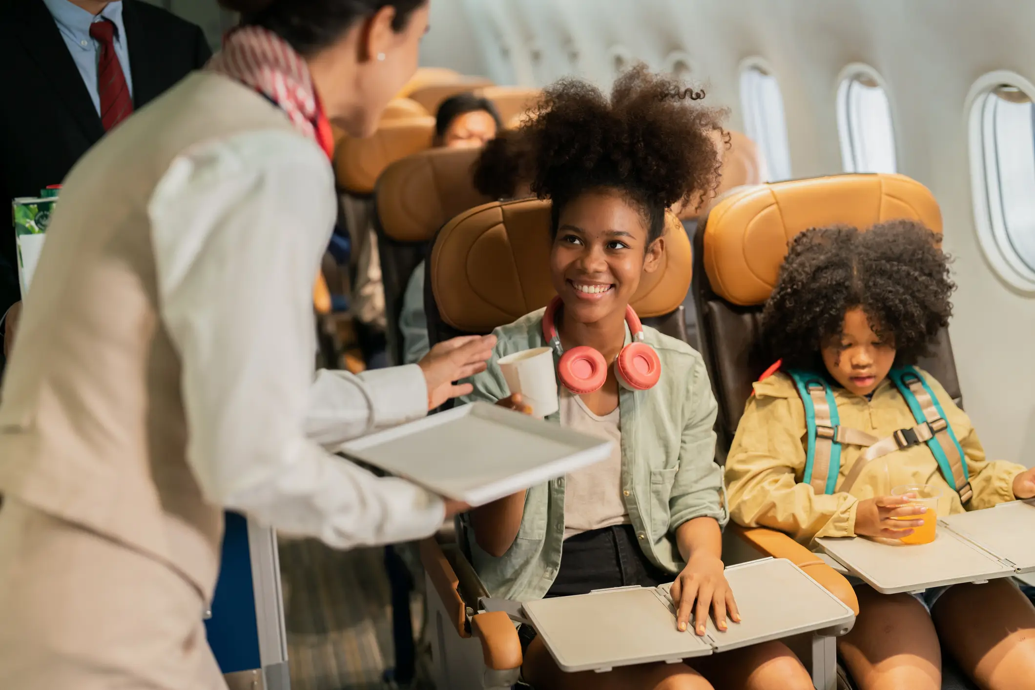 There's no need to grab flight attendants to get their attention (Getty Stock)