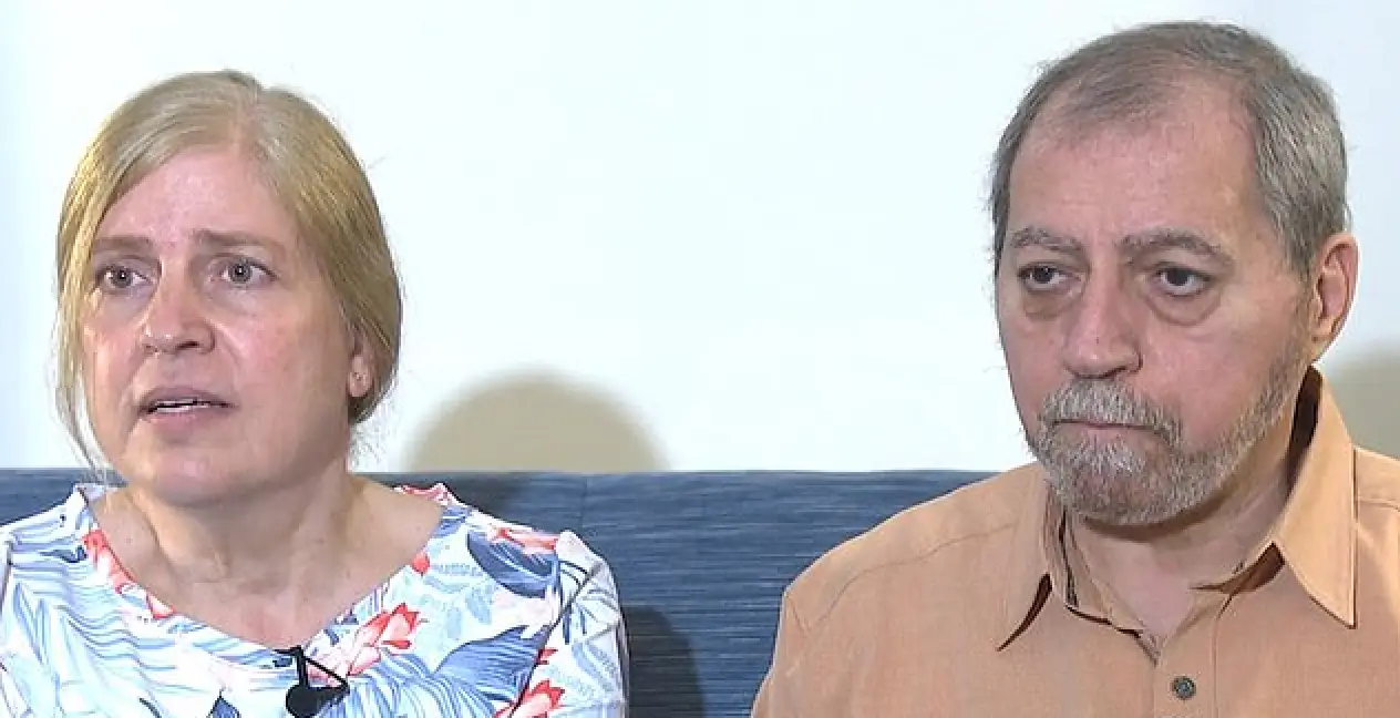 The couple found that someone had built a house on their land (CBS)