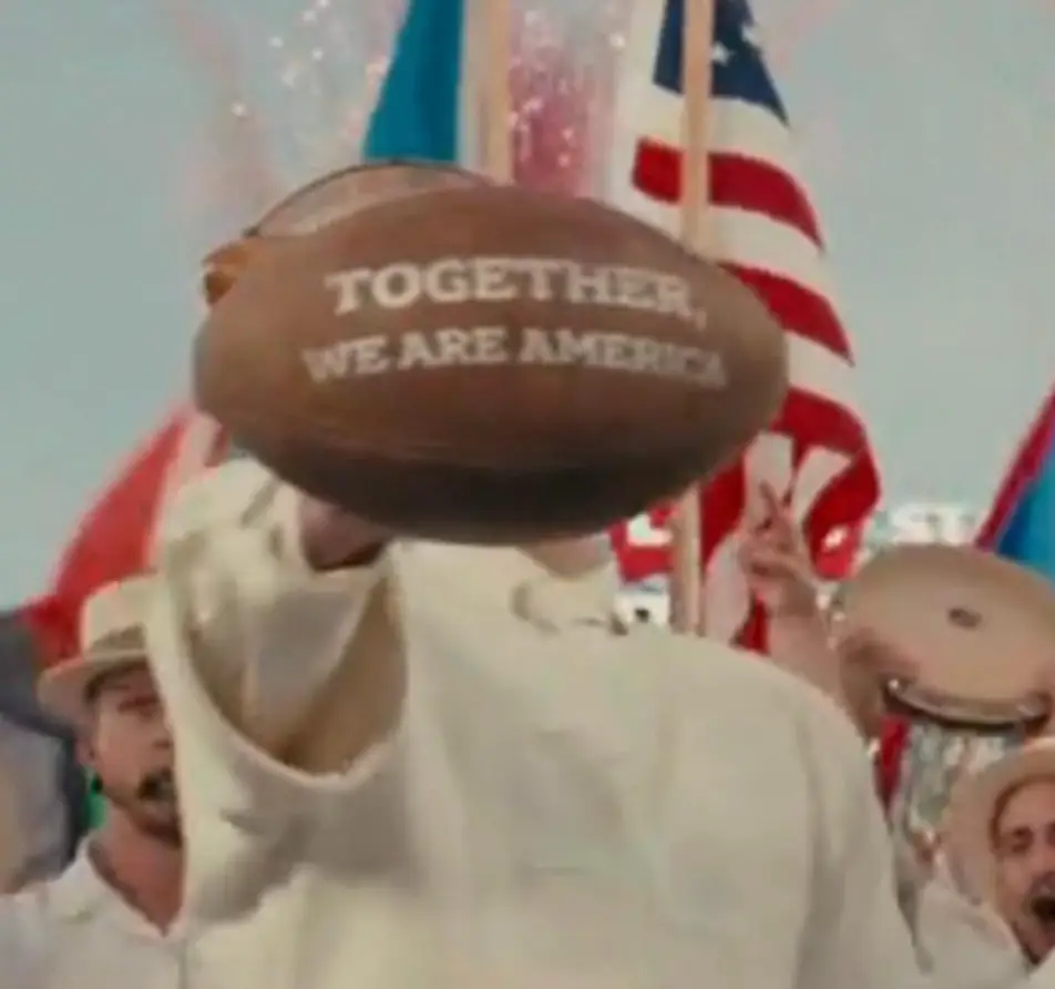 The rapper shared a subtle message on the football (NBC)