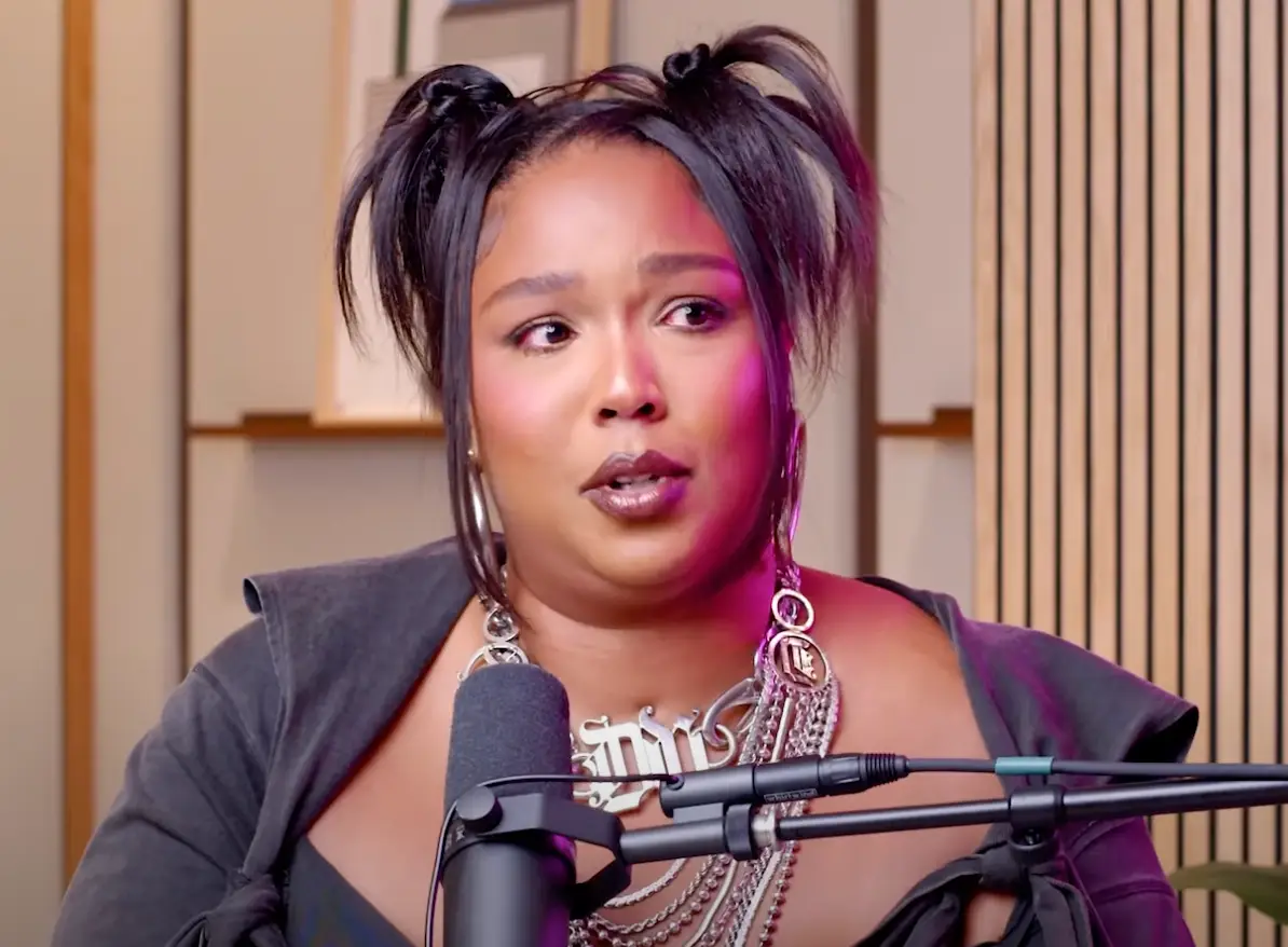 Lizzo became emotional as she discussed the hardships she's faced (@BabyThisisKekePalmer/YouTube)