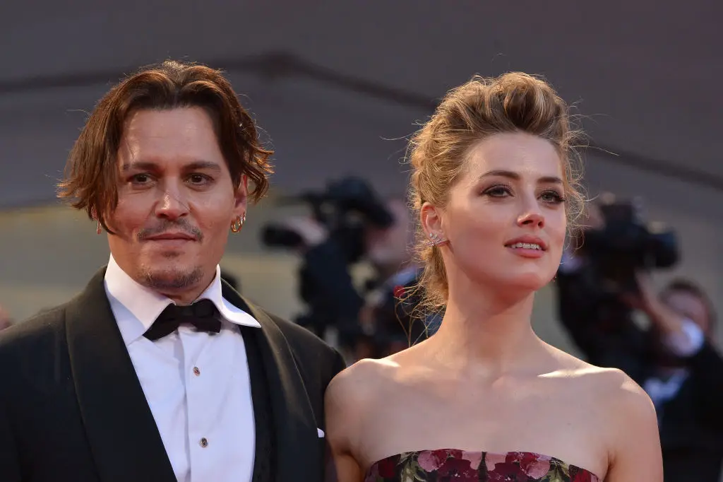 Amber Herd left Hollywood after an acrimonious break up with Jonny Depp. (Photo by TIZIANA FABI/AFP via Getty Images)