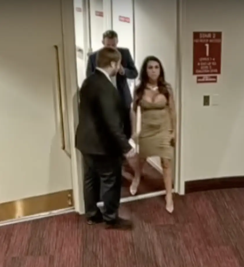 Boebert and her companion leave the theater.