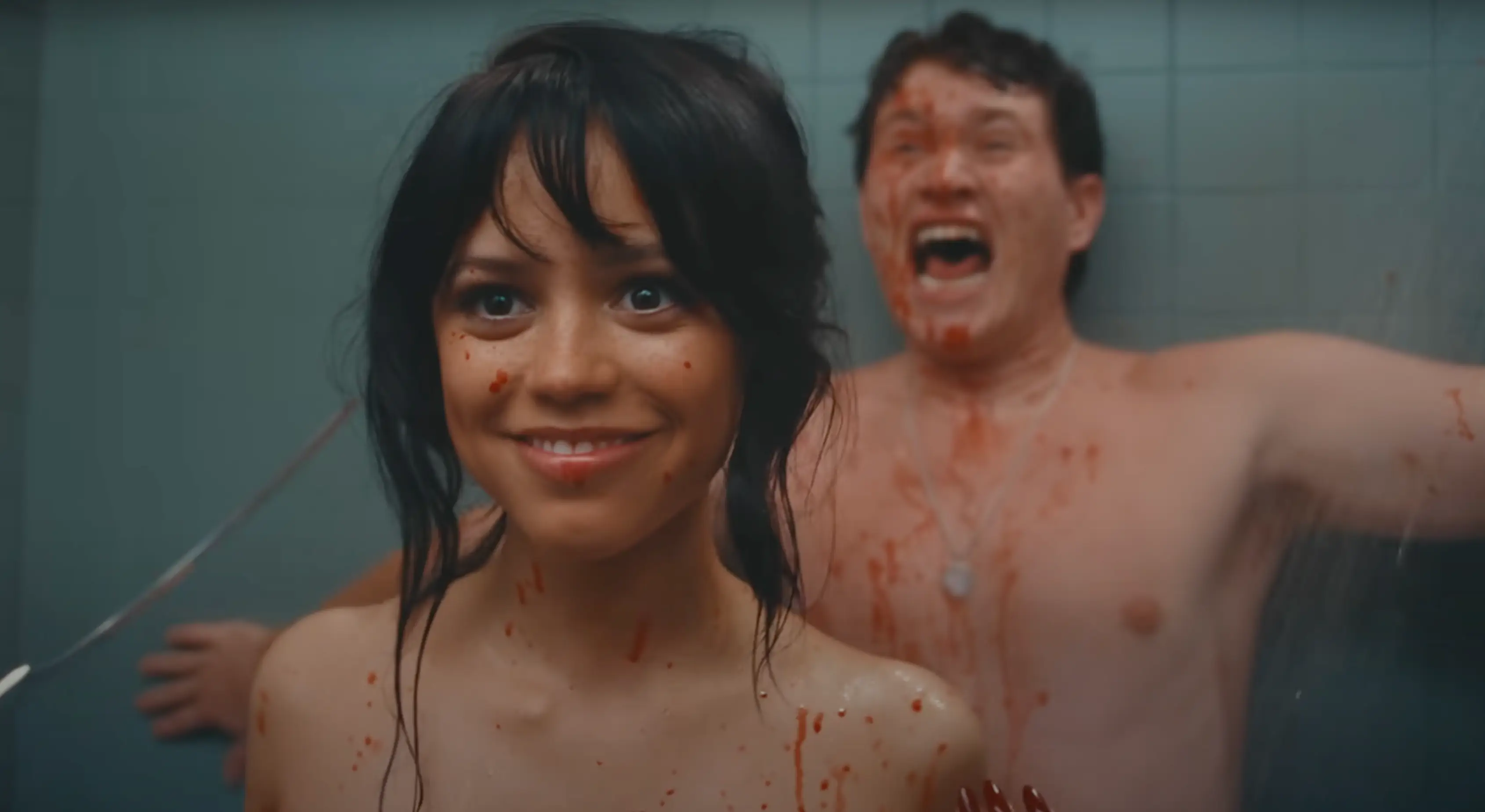 Jenna Ortega is attacked while showering in the Taste's official music video. (YouTube/Sabrina Carpenter)