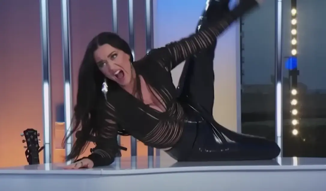 Perry bashed out a bit of air guitar.