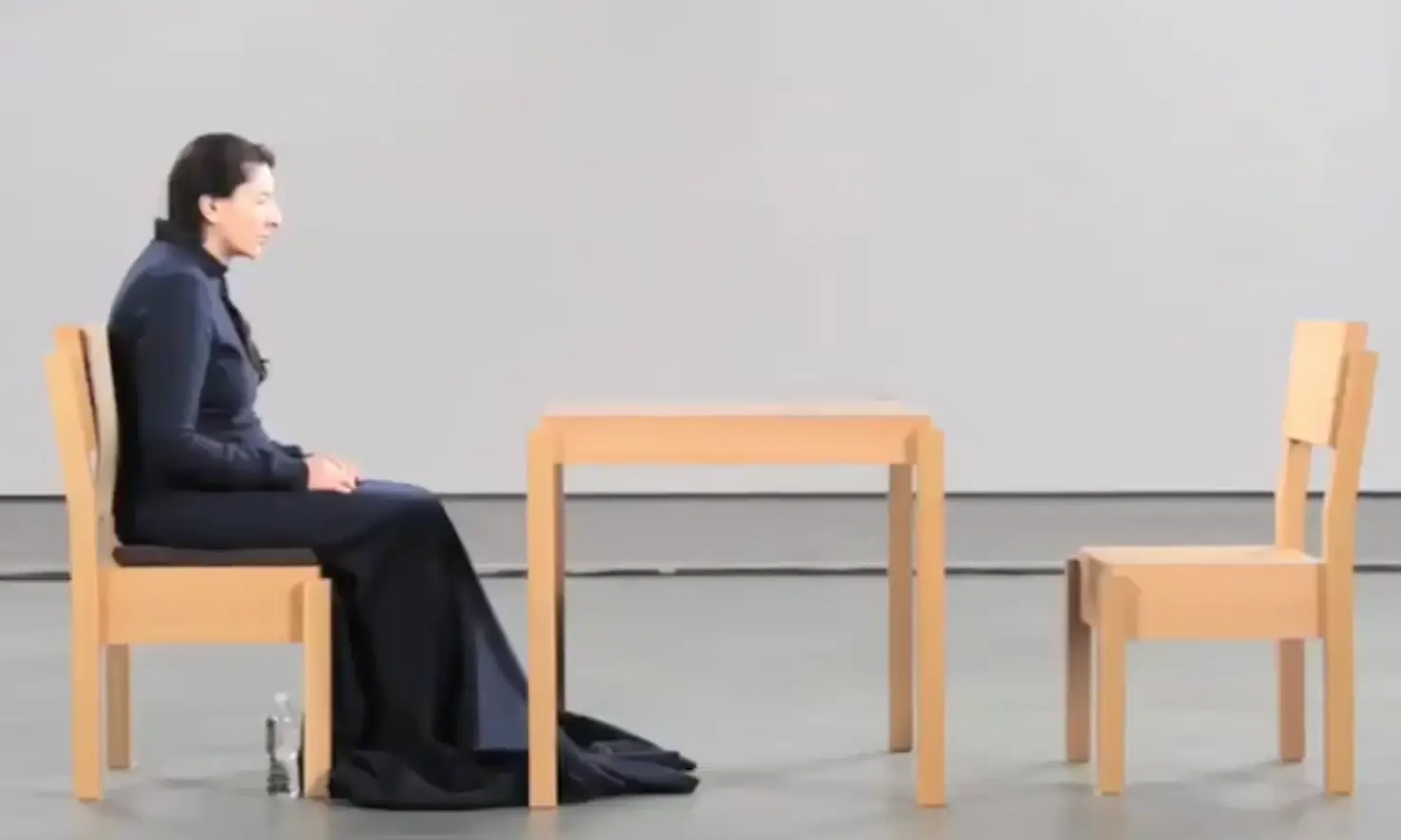 Marina Abramović sat in the chair for hours each day (YouTube/Museum of Modern Art)