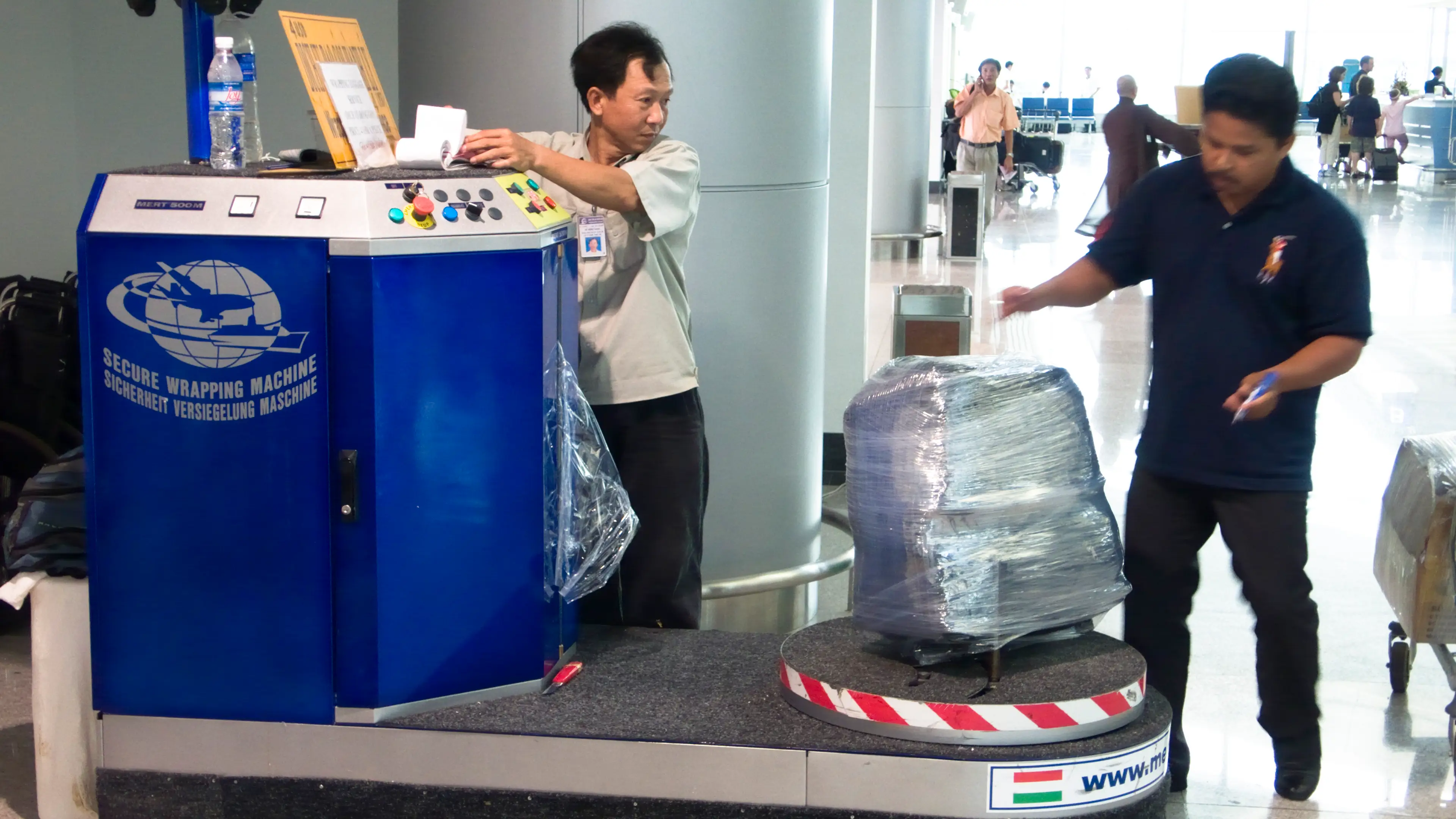 Airports often offer this wrapping service, but it can signal to thieves that you have something worth robbing (Andrew Woodley/Education Images/Universal Images Group via Getty Images)