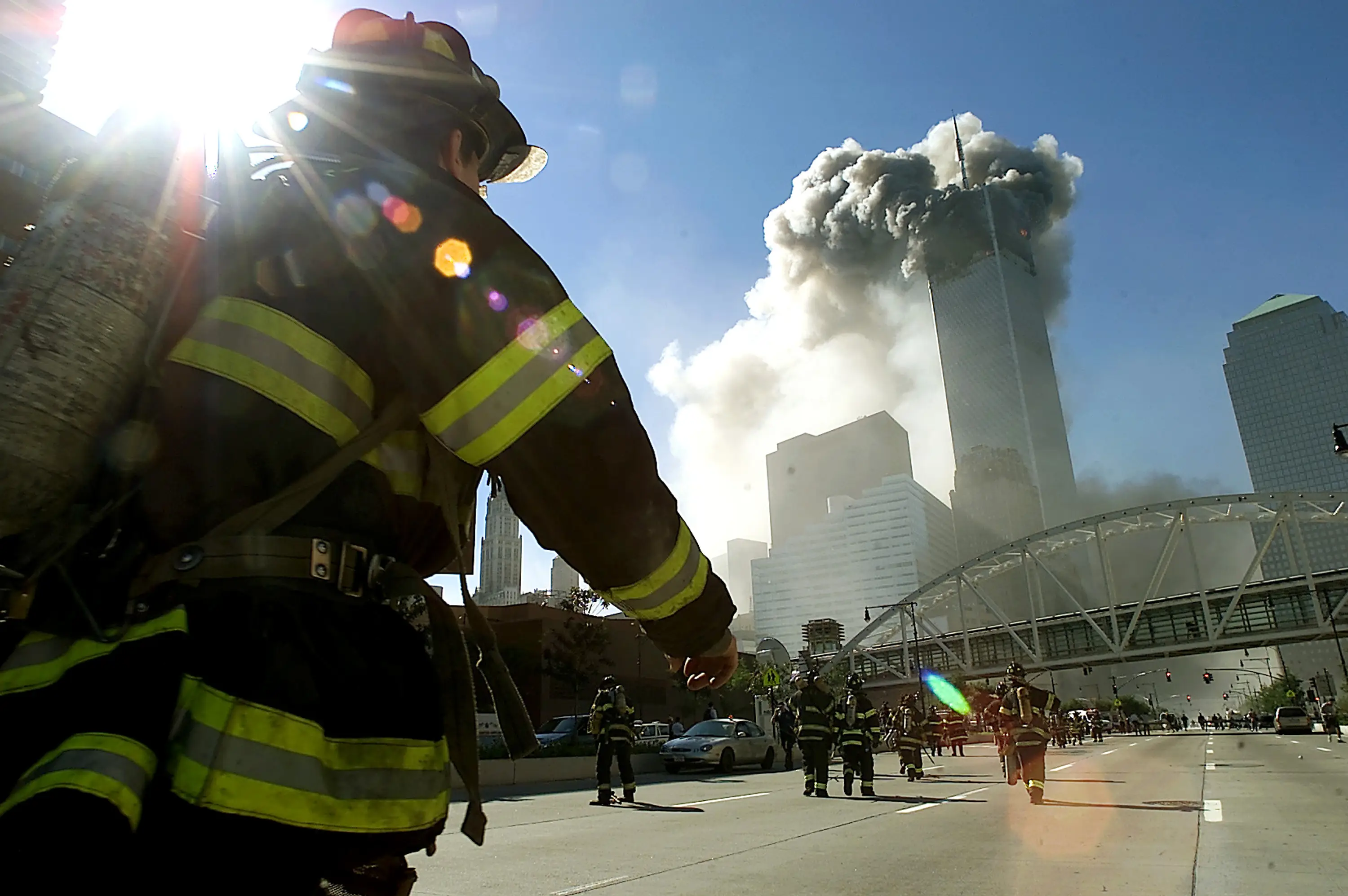 A band of first responders head towards the Twin Towers during the 9/11 attacks (Jose Jimenez/Primera Hora/Getty Images)