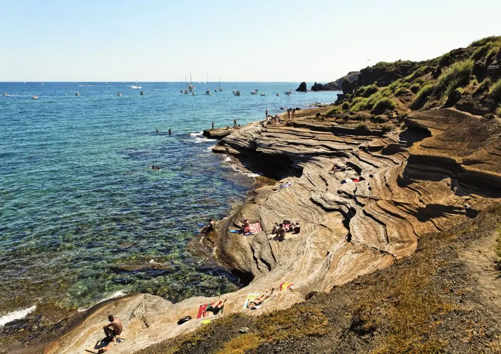 The beach is now overlooked by police and security from a tower to try and get the swinging under control (Bruno de Hogues/Gamma-Rapho via Getty Images)
