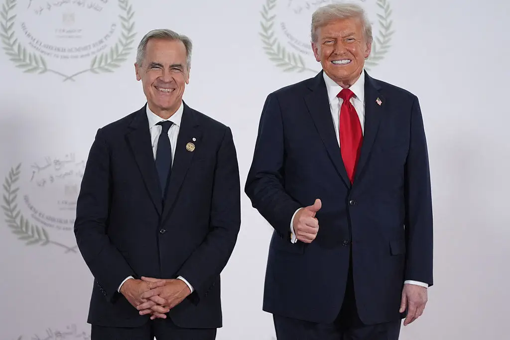 Things are far from all smiles between Mark Carney and Donald Trump (EVAN VUCCI/POOL/AFP via Getty Images)