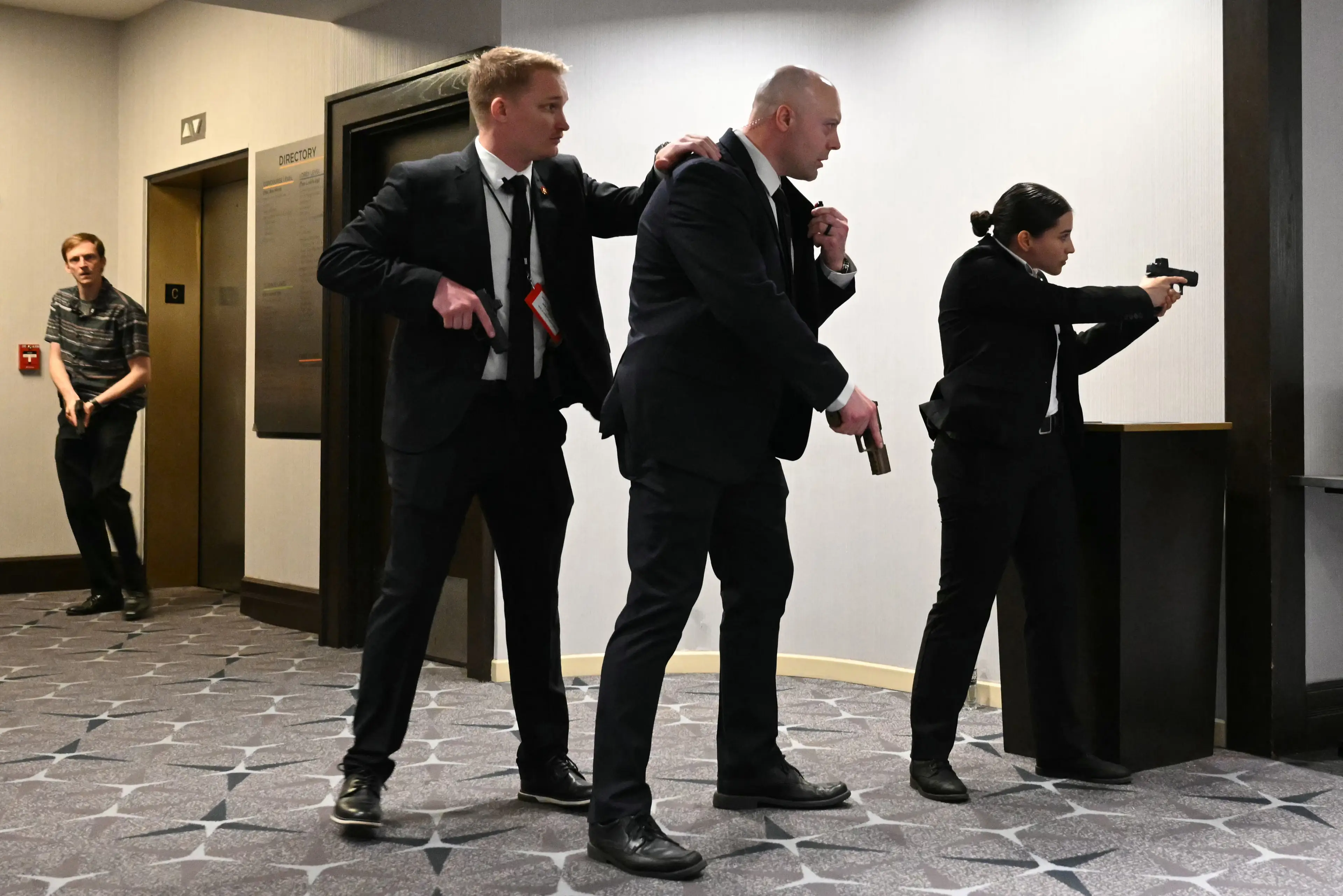 Trump was evacuated from the event as gunshots rang out (Mandel NGAN / AFP via Getty Images)