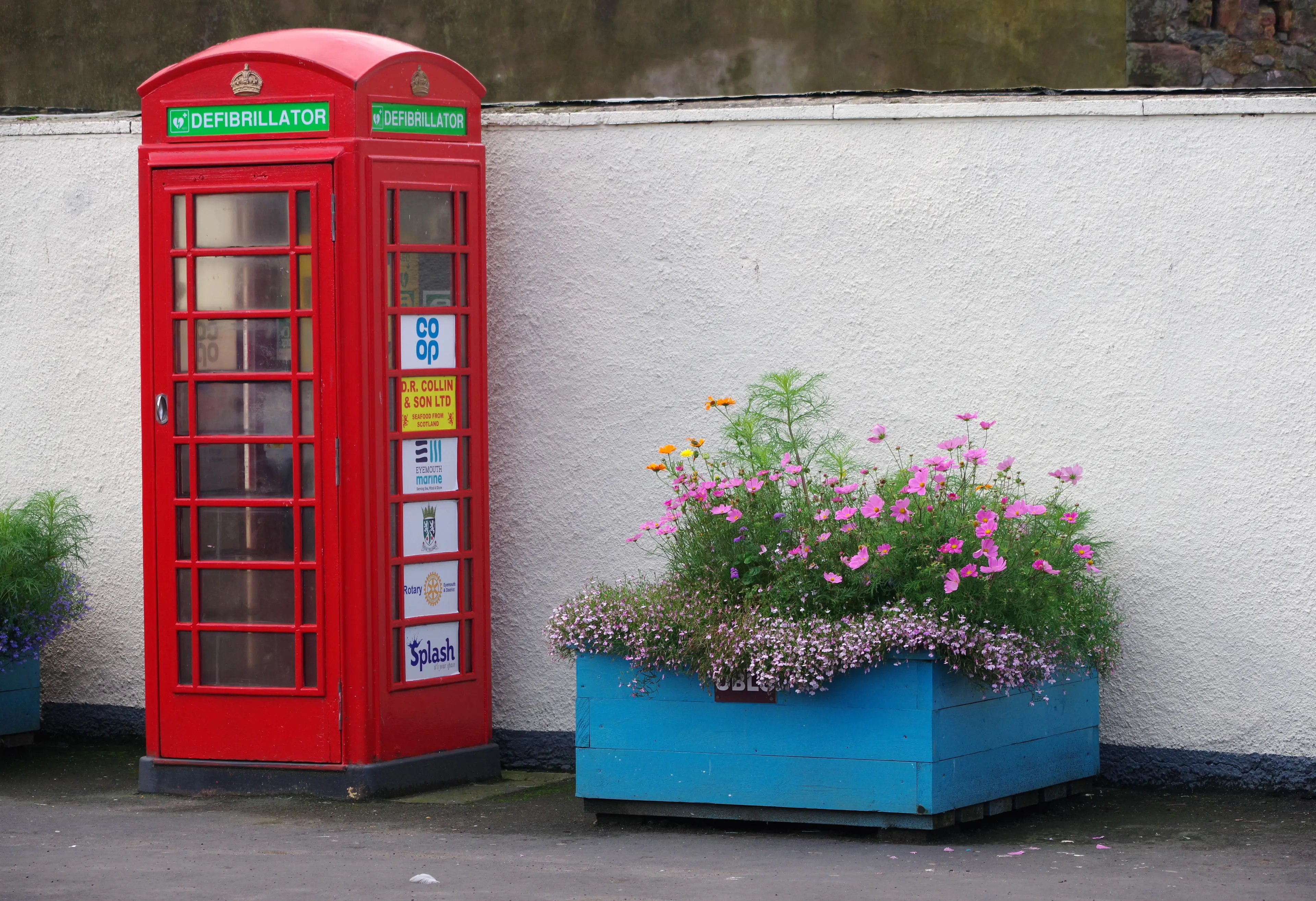 Some disused traditional red phone boxes are being used as defibrillator stations in the UK.