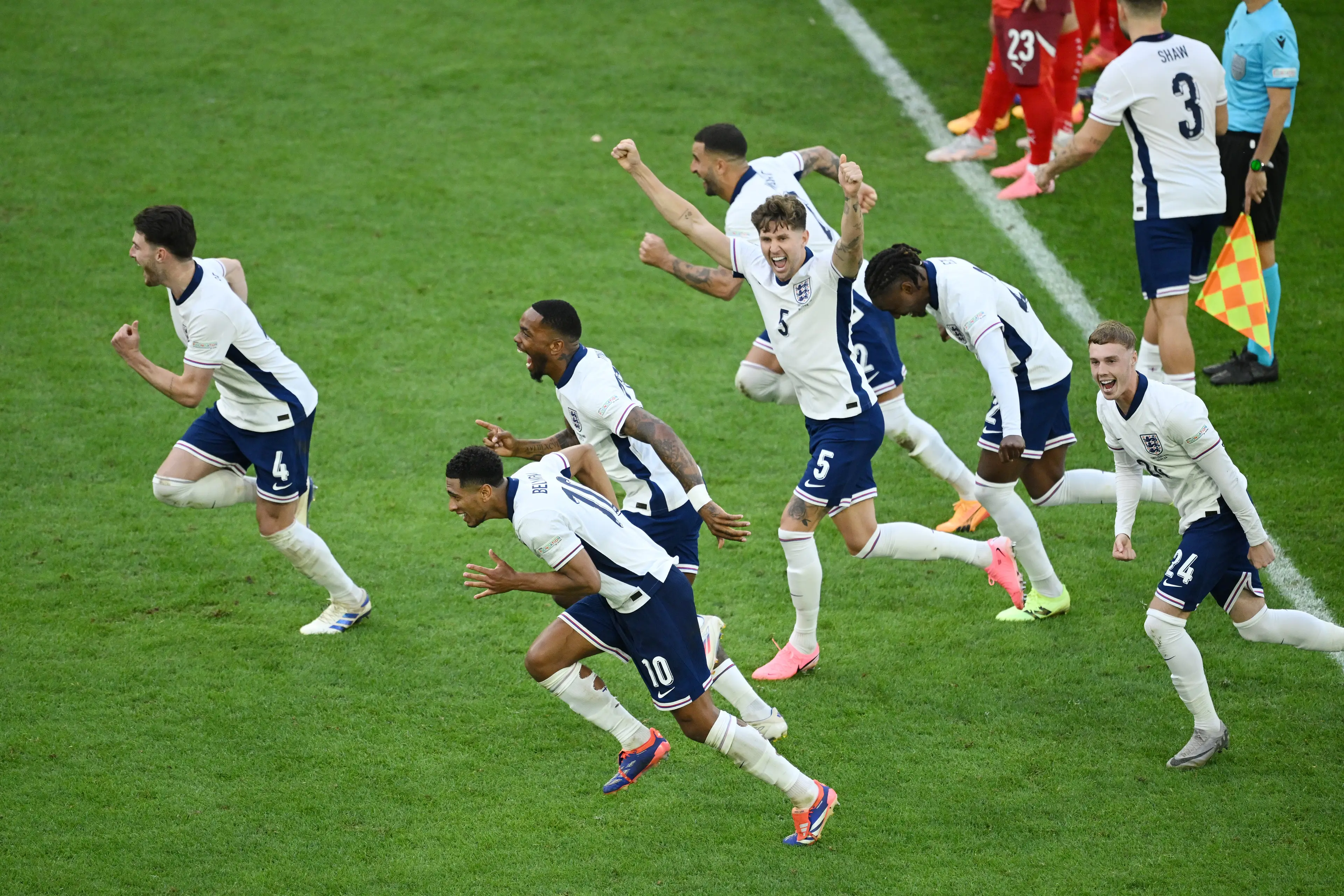 The penalty takers and their assigned 'buddies' seen celebrating post-penalty shootout (Clive Mason/Getty Images)