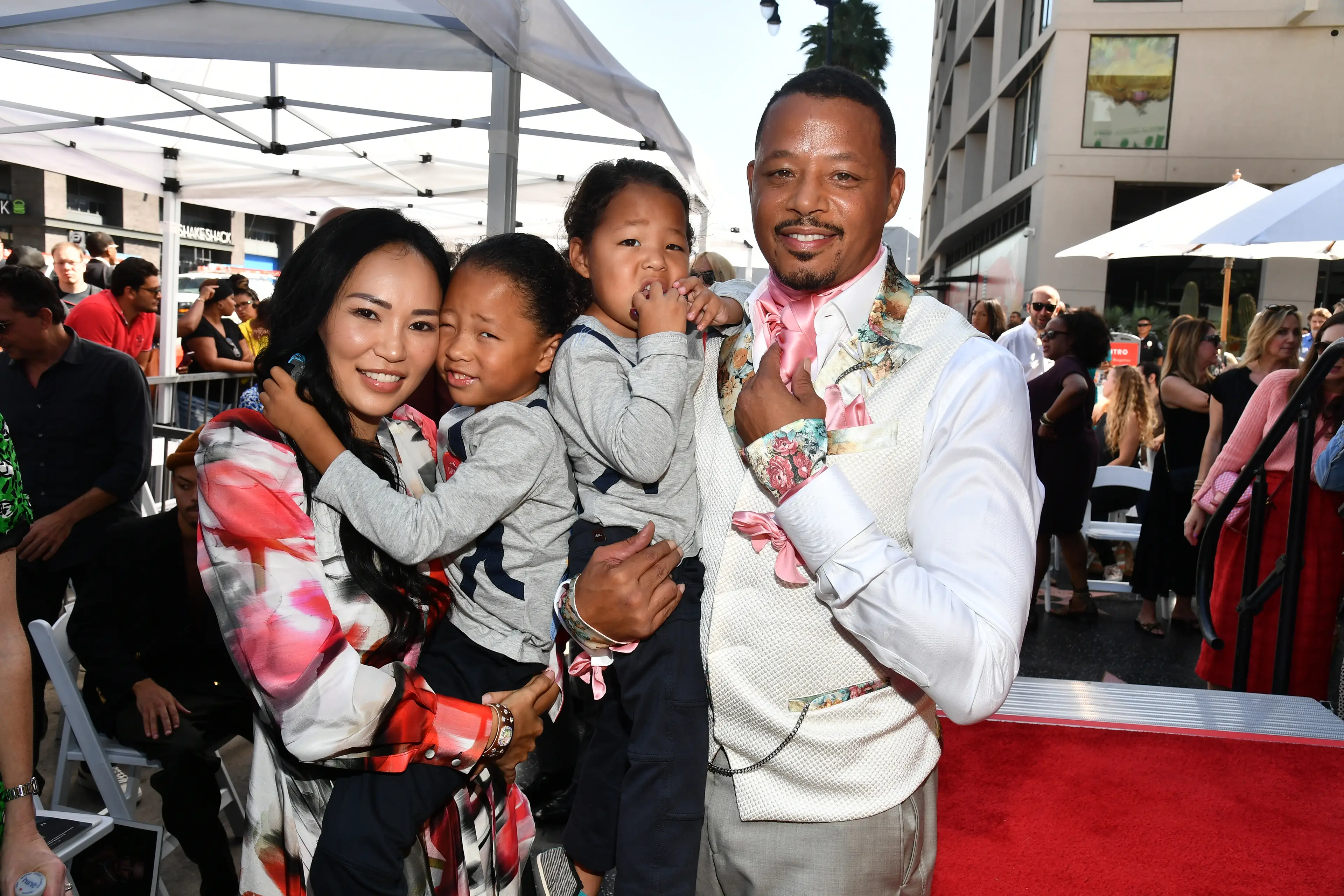 Howard and Mira Pak pictured with their young sons in 2019 (Michael Buckner/Variety/Penske Media via Getty Images)