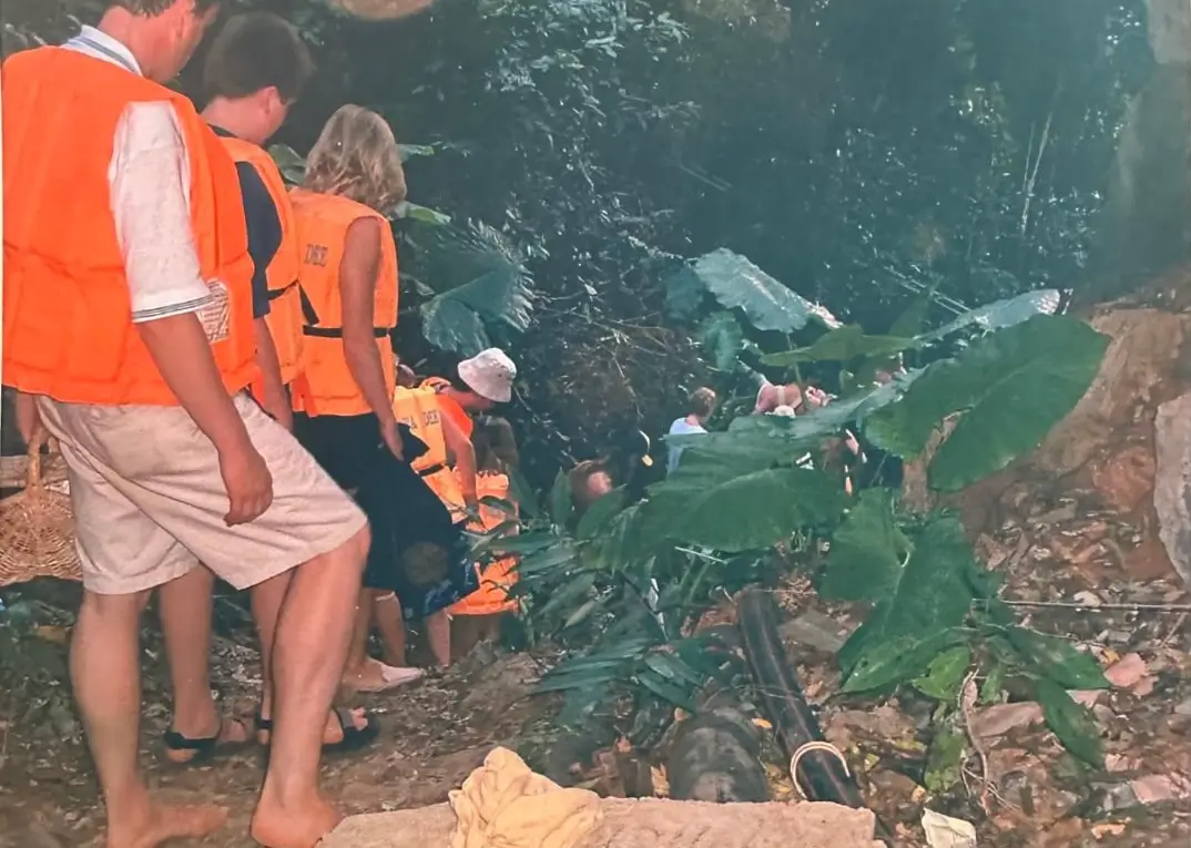 The family were forced to flee up a cliff to shelter from the waves (Supplied)