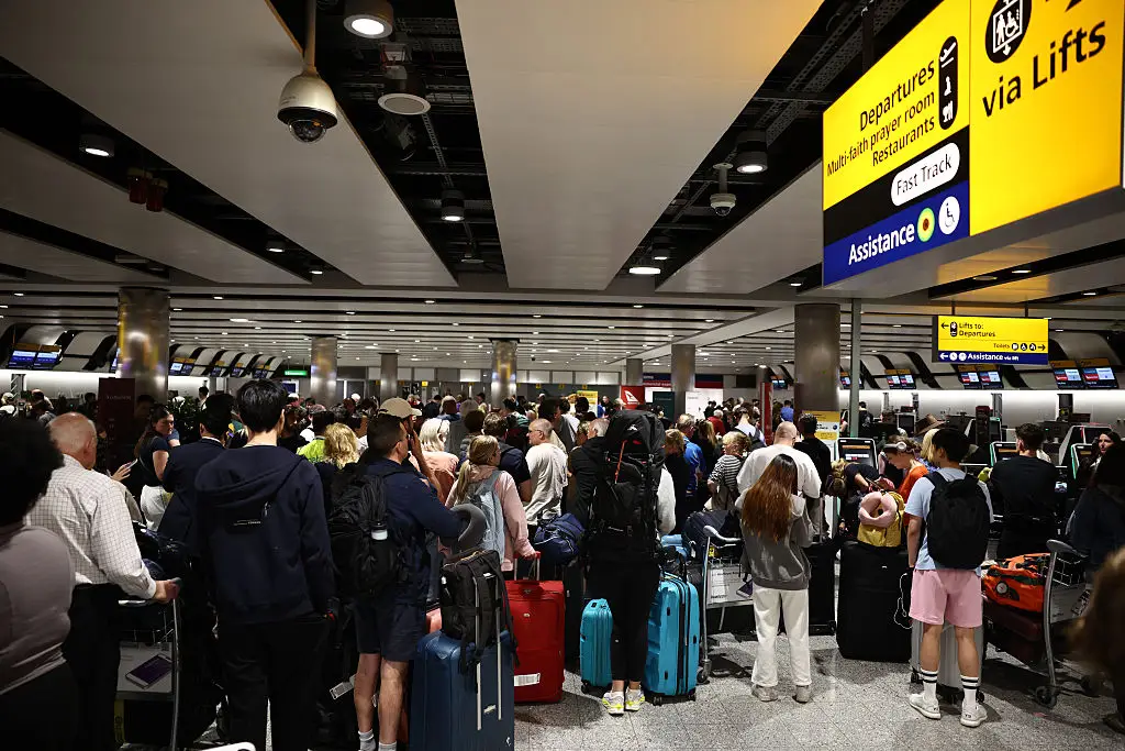Passengers were left stuck at airports (Henry NICHOLLS / AFP via Getty Images)