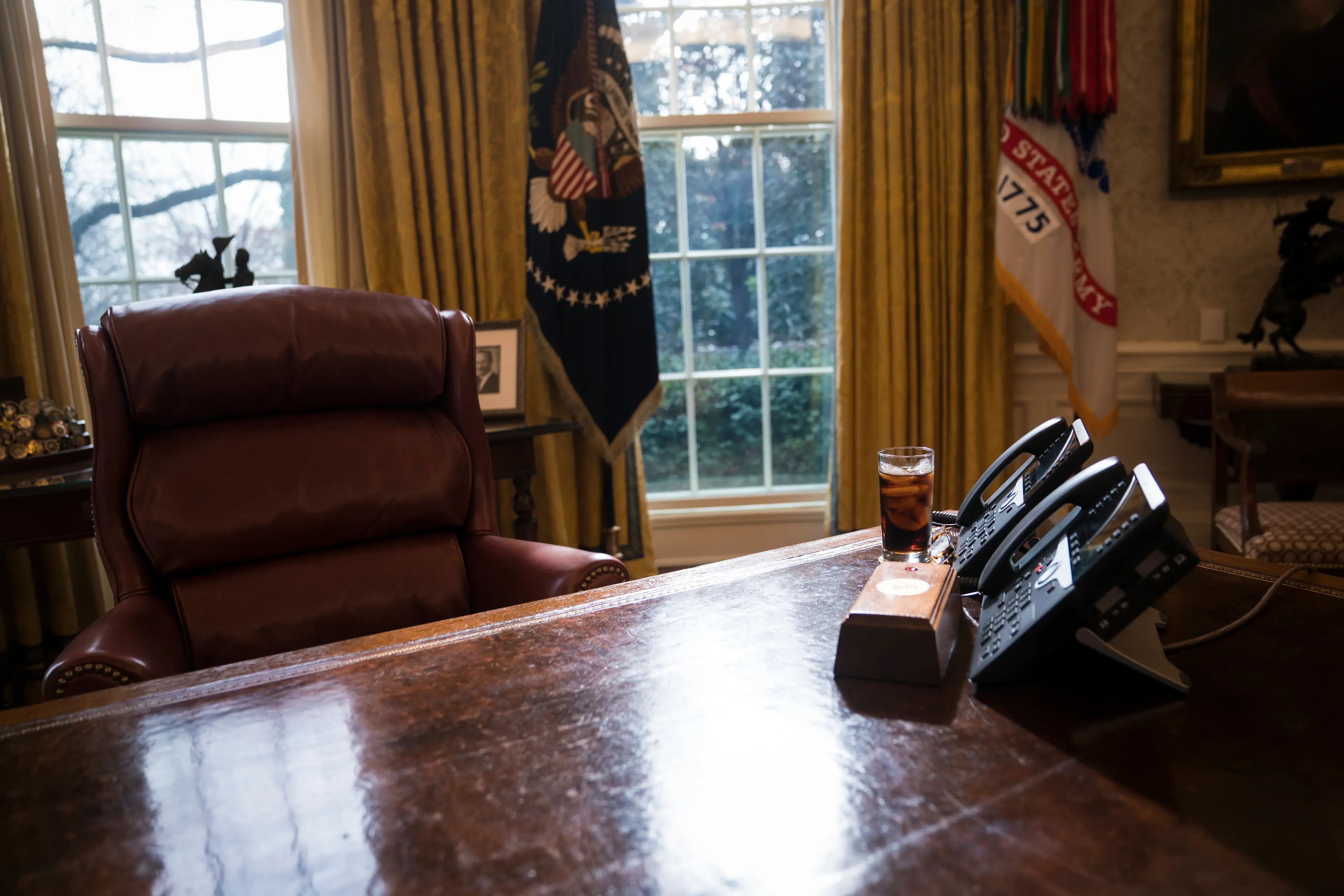 Donald Trump's desk during his presidency, along with the famous call button (Jabin Botsford/The Washington Post via Getty Images)