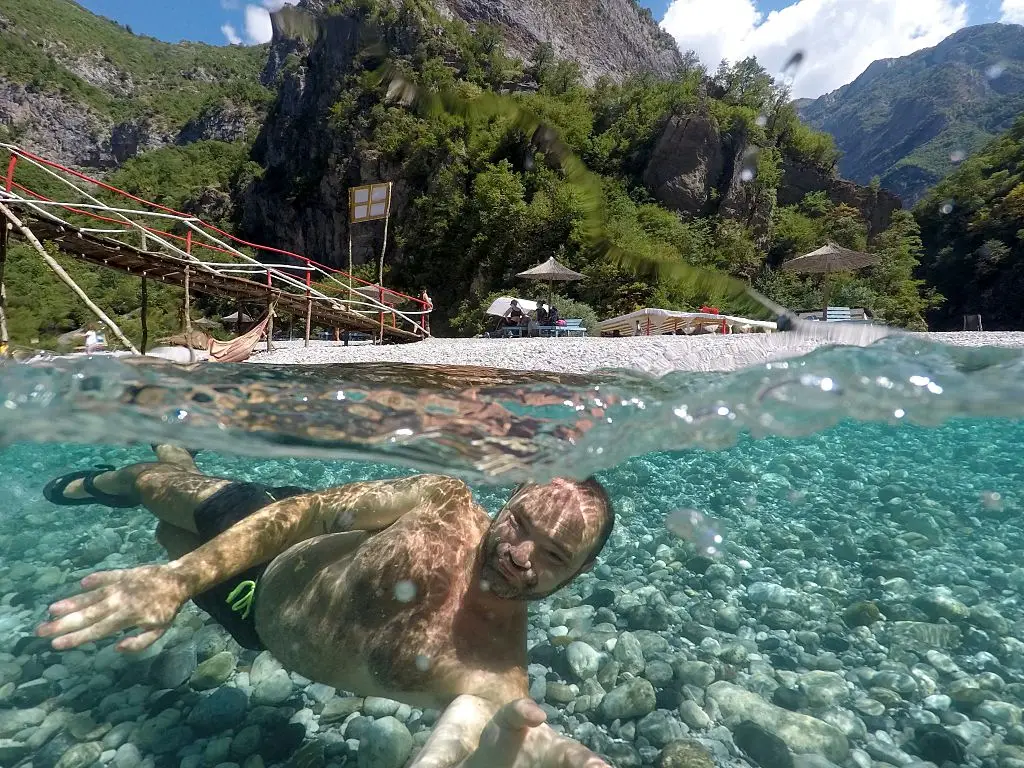 This bloke certainly looks like he's having fun (GENT SHKULLAKU/AFP via Getty Images)