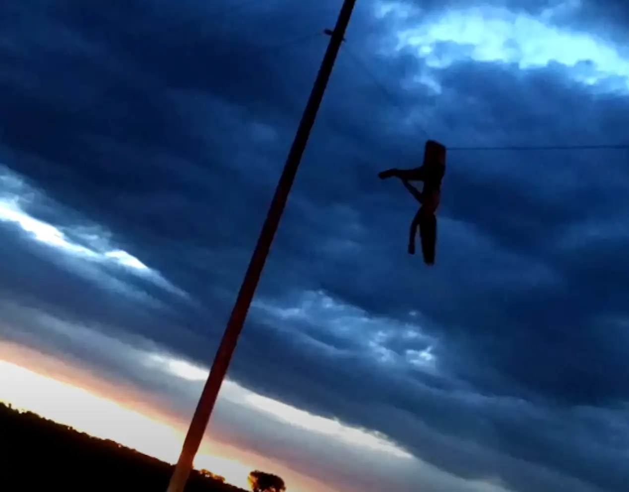 This horrific photo shows how helpless Kennedy was when she was on the power line. (Inside Edition/Instagram/@_kickitkenny_9)