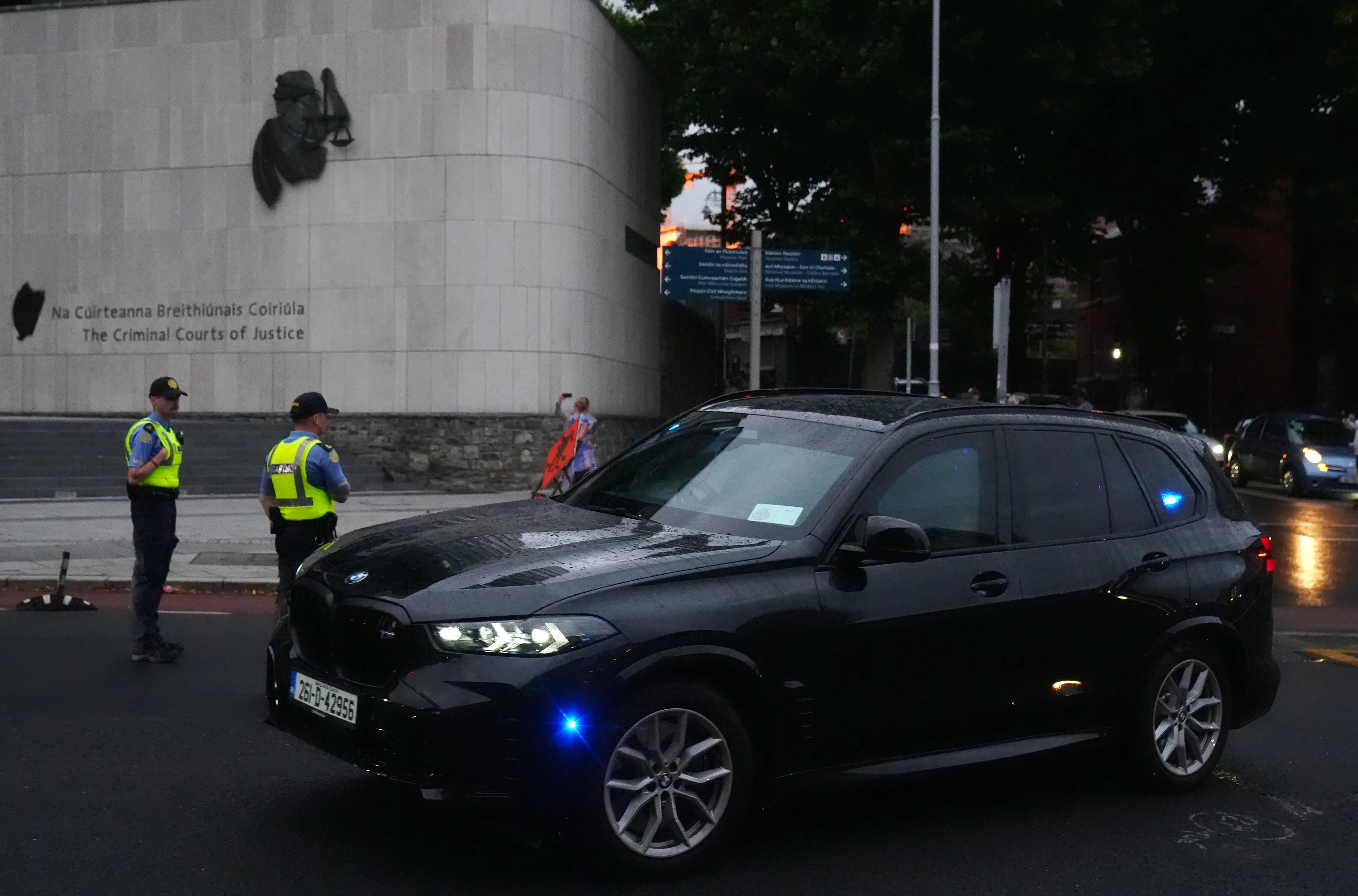 Garda vehicles leaving the Criminal Courts of Justice in (Dublin Brian Lawless/PA Wire)