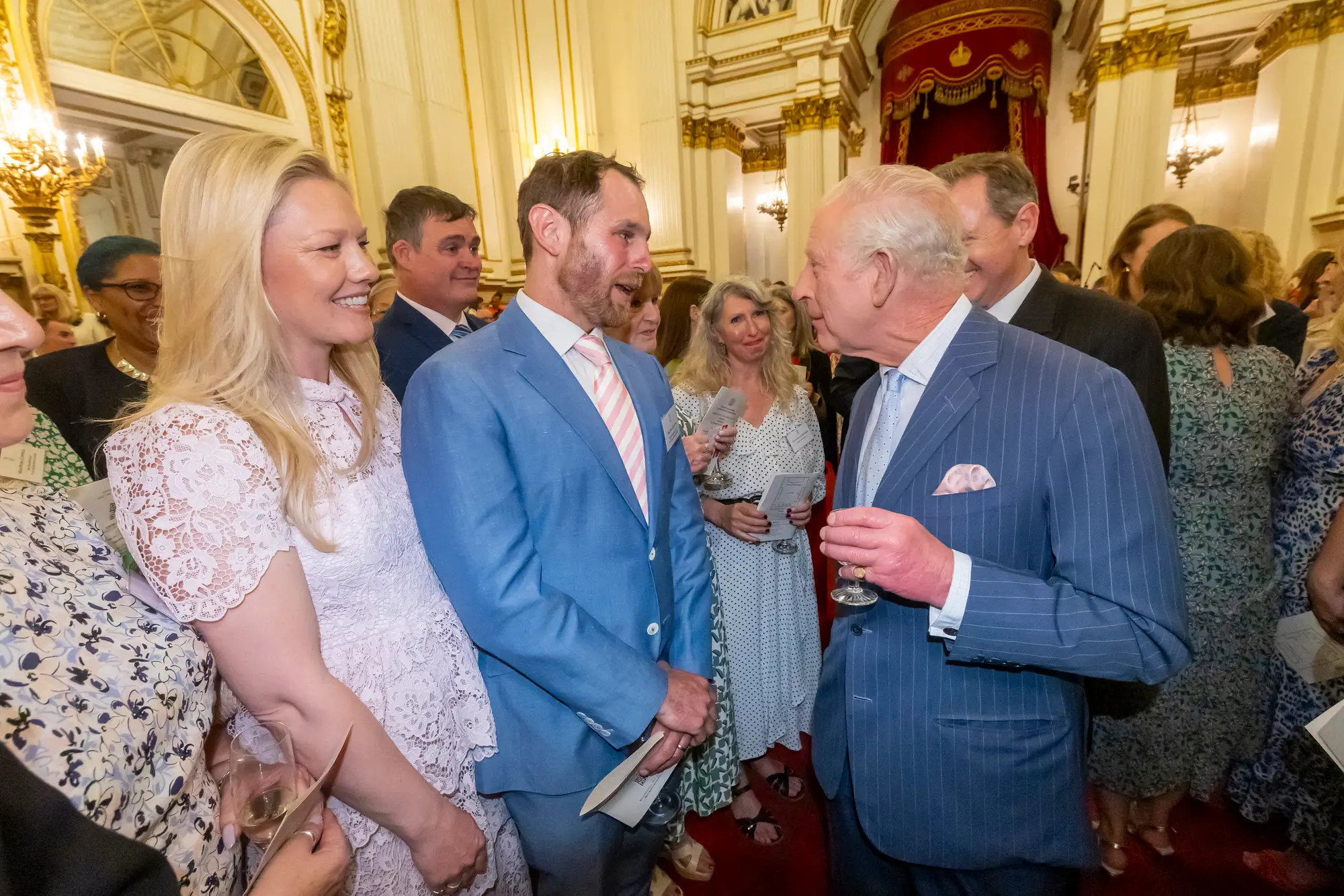 Ollie and his wife met the King at Buckingham Palace (Supplied)