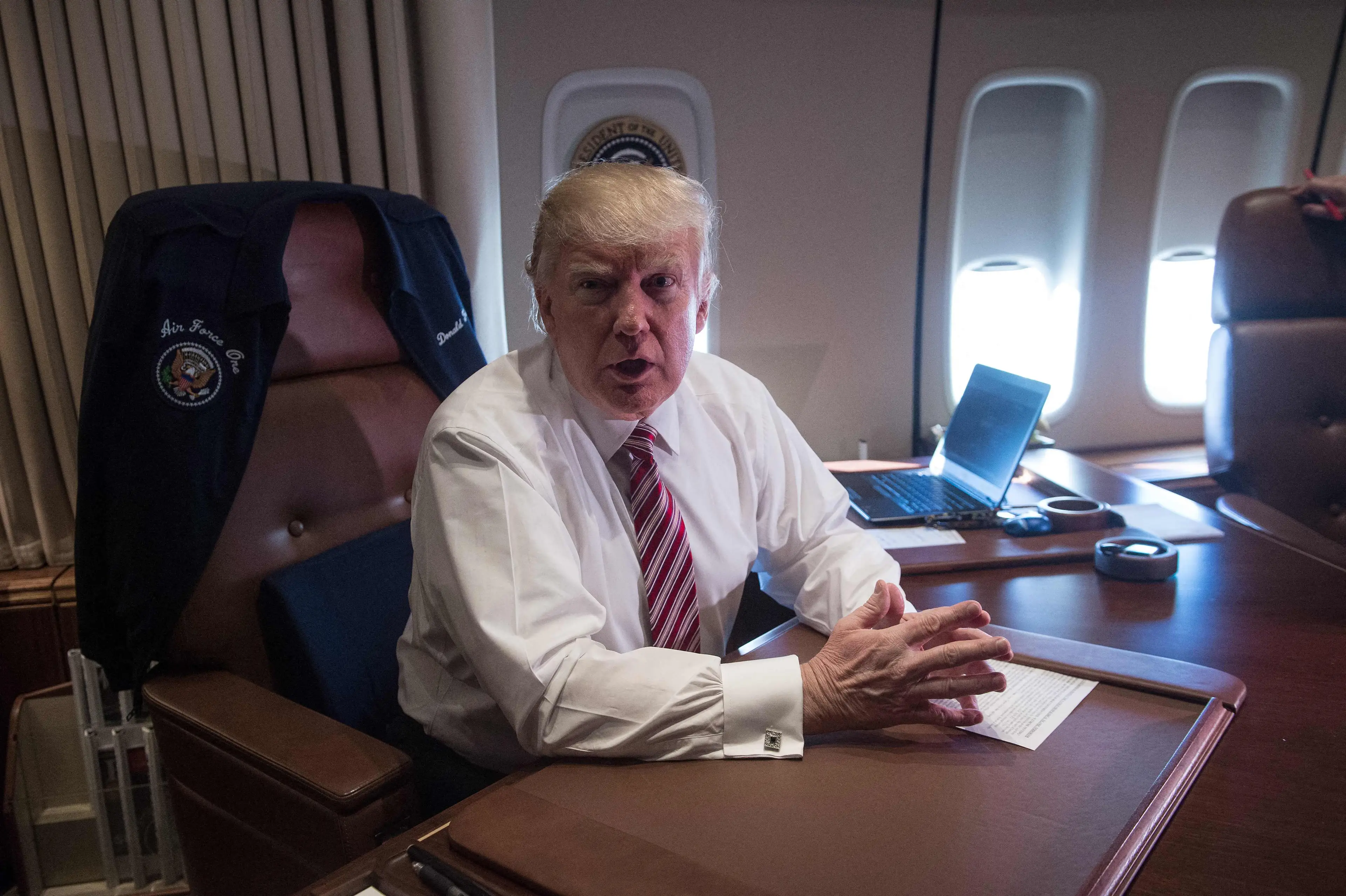 Trump on Air Force One back in 2017 (NICHOLAS KAMM/AFP via Getty Images)
