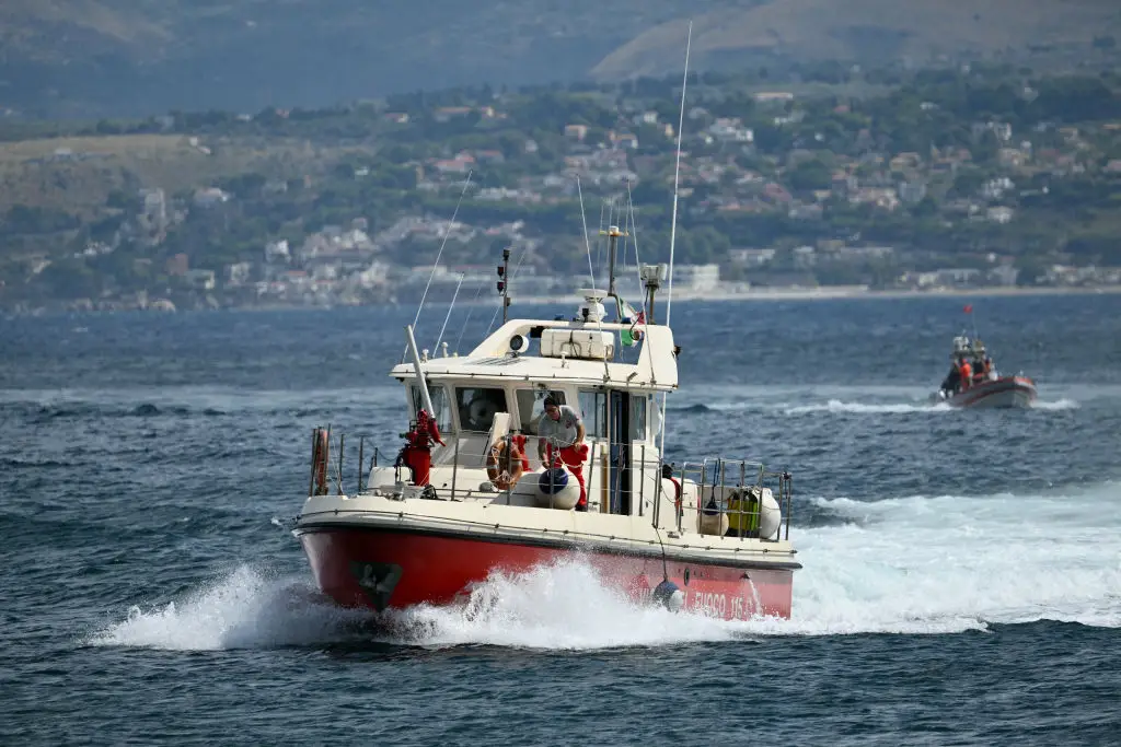 Rescuers continue their search where the yacht sank. (ALBERTO PIZZOLI/AFP via Getty Images)