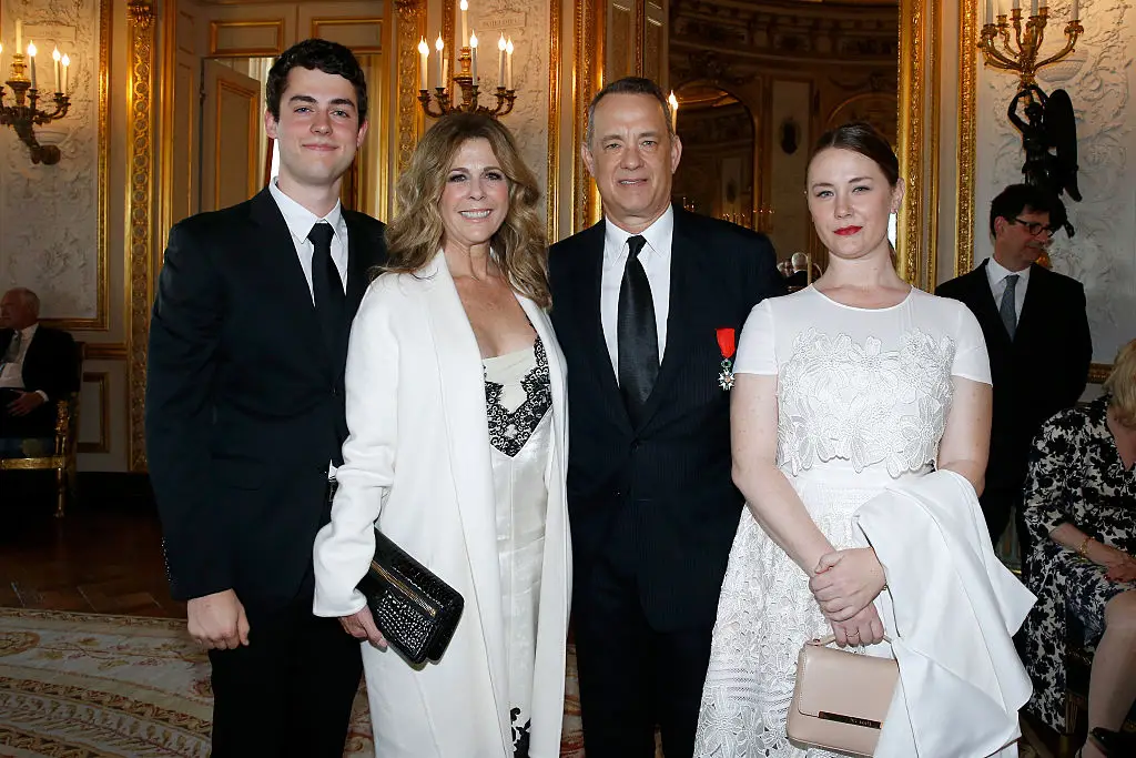 E.A Hanks (right) pictured with her half-brother Truman, their dad Tom Hanks and his wife Rita Wilson (Bertrand Rindoff Petroff/Getty Images)