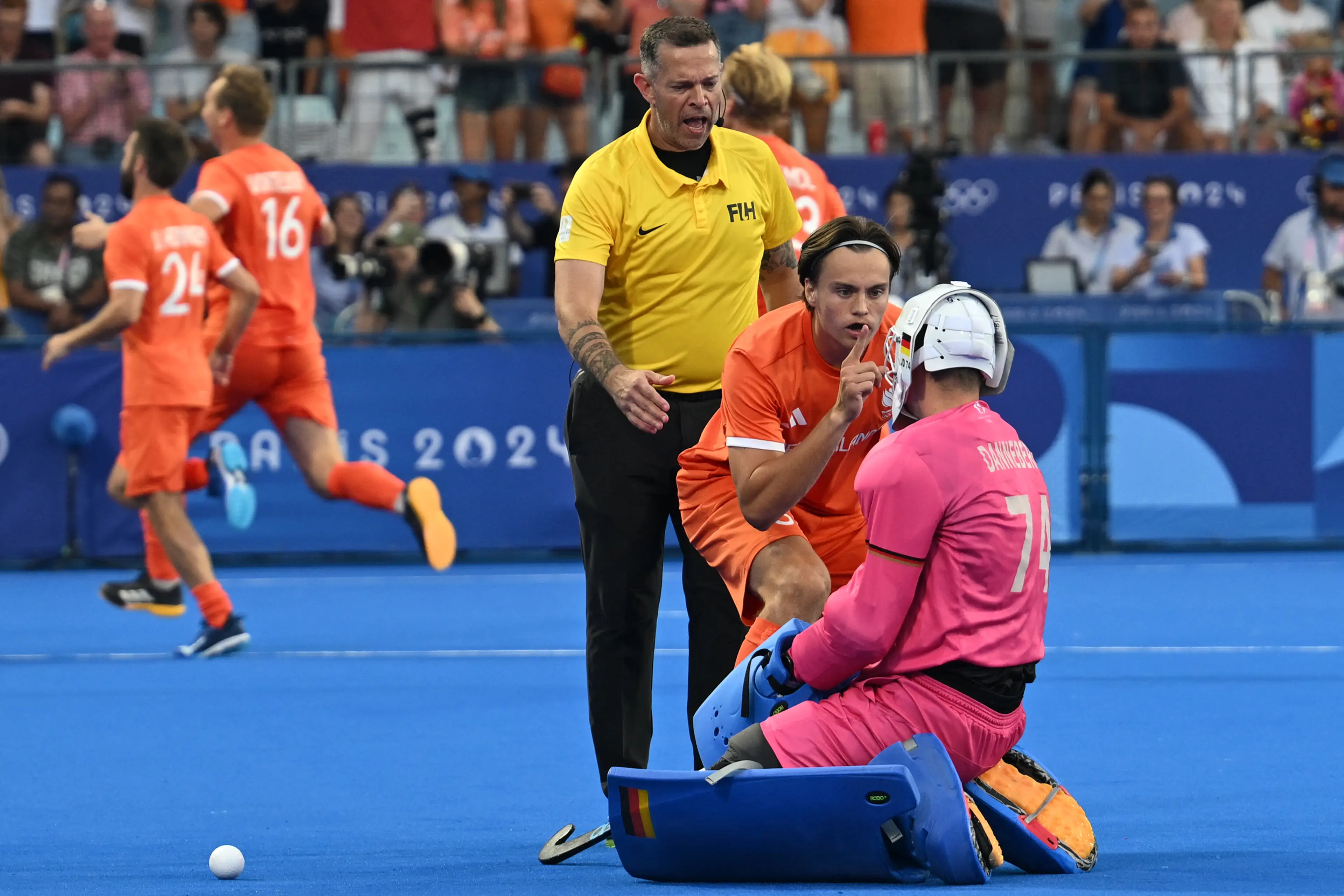 German goalkeeper Jean-Paul Danneberg was shushed by The Netherlands' Duco Telgenkamp. (ARUN SANKAR/AFP via Getty Images)