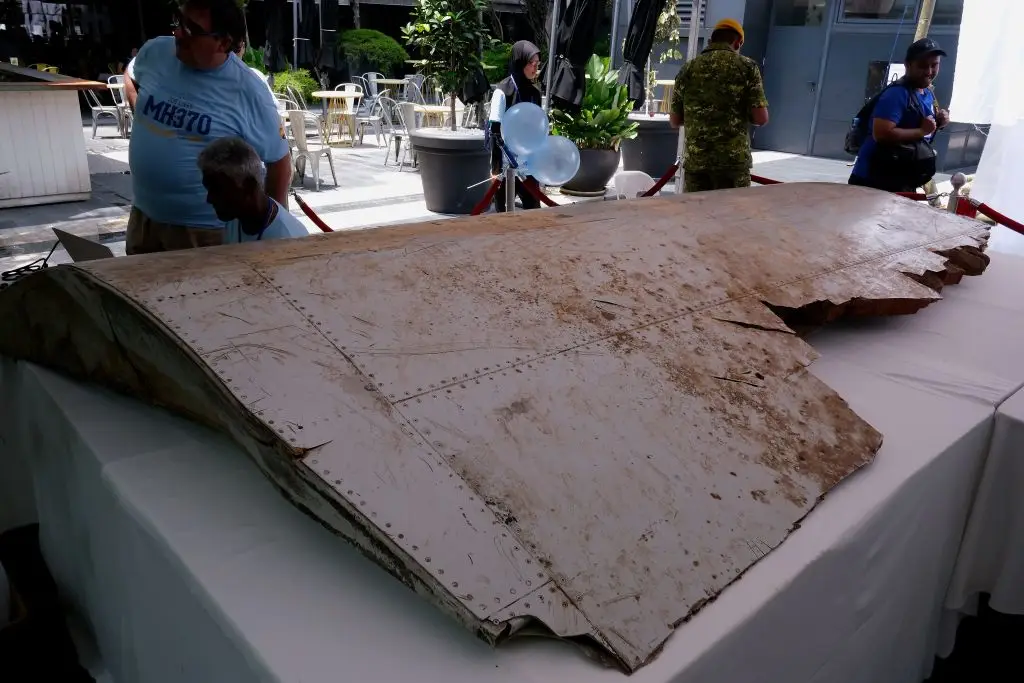 A debris wing flap from MH370 was found early on in searches, but investigators still don't know where the plane wreckage is located (Mohd Samsul Mohd Said/Getty Images)