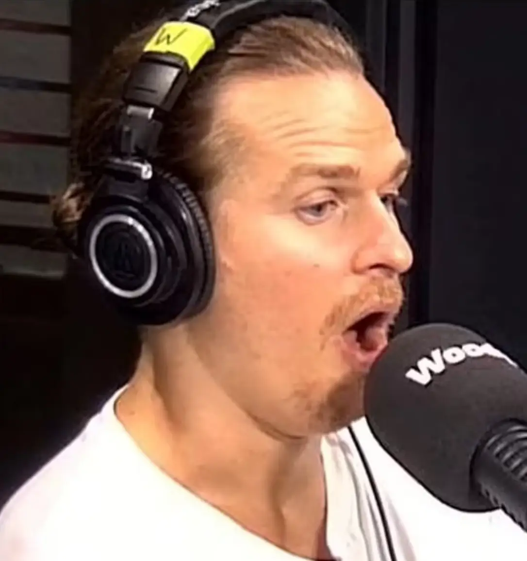 Woody couldn't believe what he was hearing from the caller. (Will & Woody)