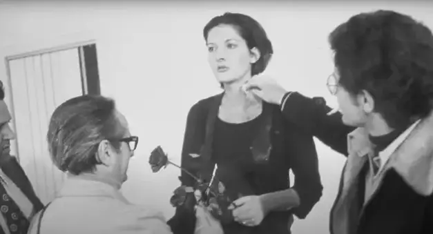 Marina Abramović's 'Rhythm 0' in 1974 allowed members of the public to do what they wanted to her body for six hours (YouTube/Marina Abramović Institute)