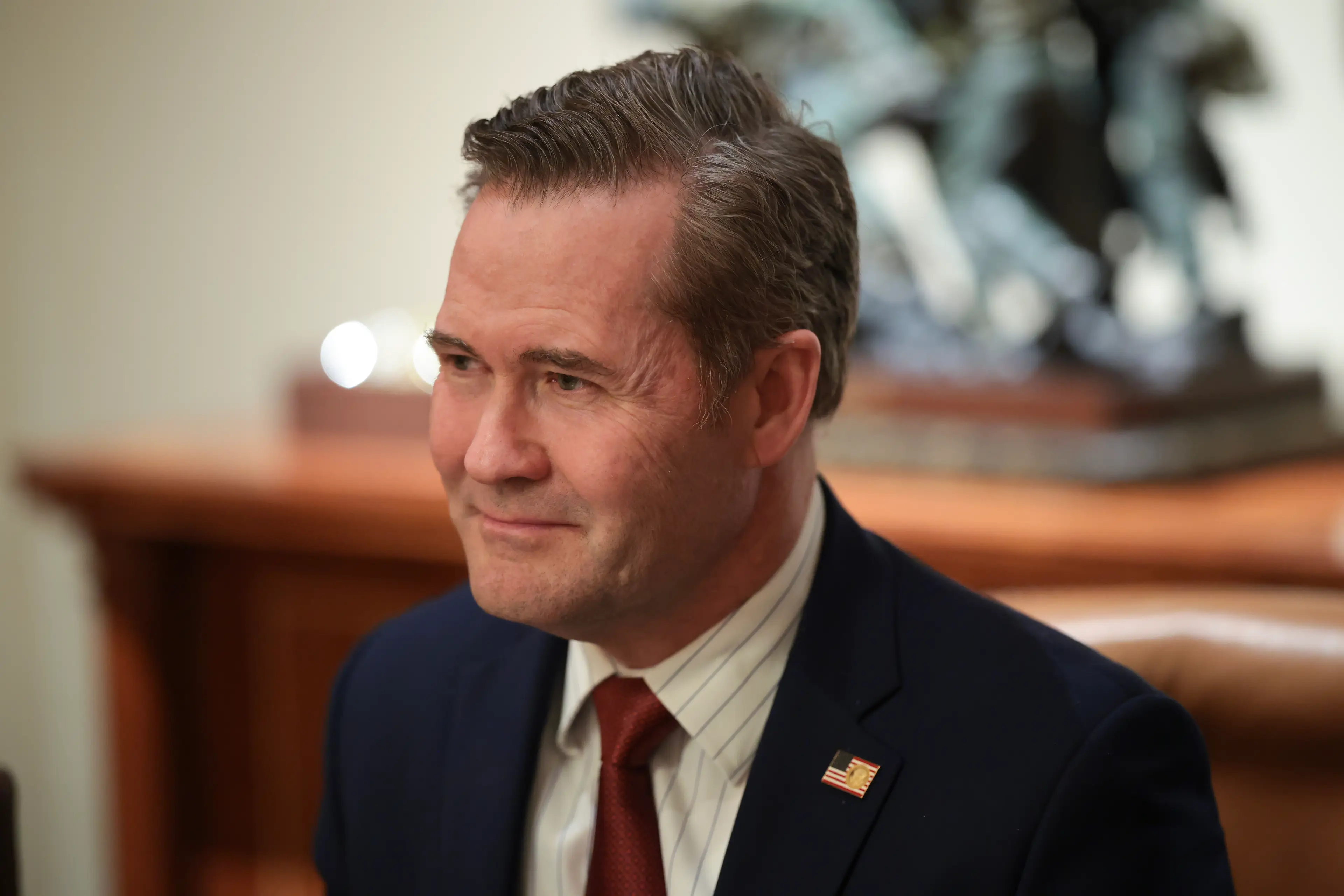 Waltz seems to have a thing for the fist and flame emojis. (Win McNamee/Getty Images)