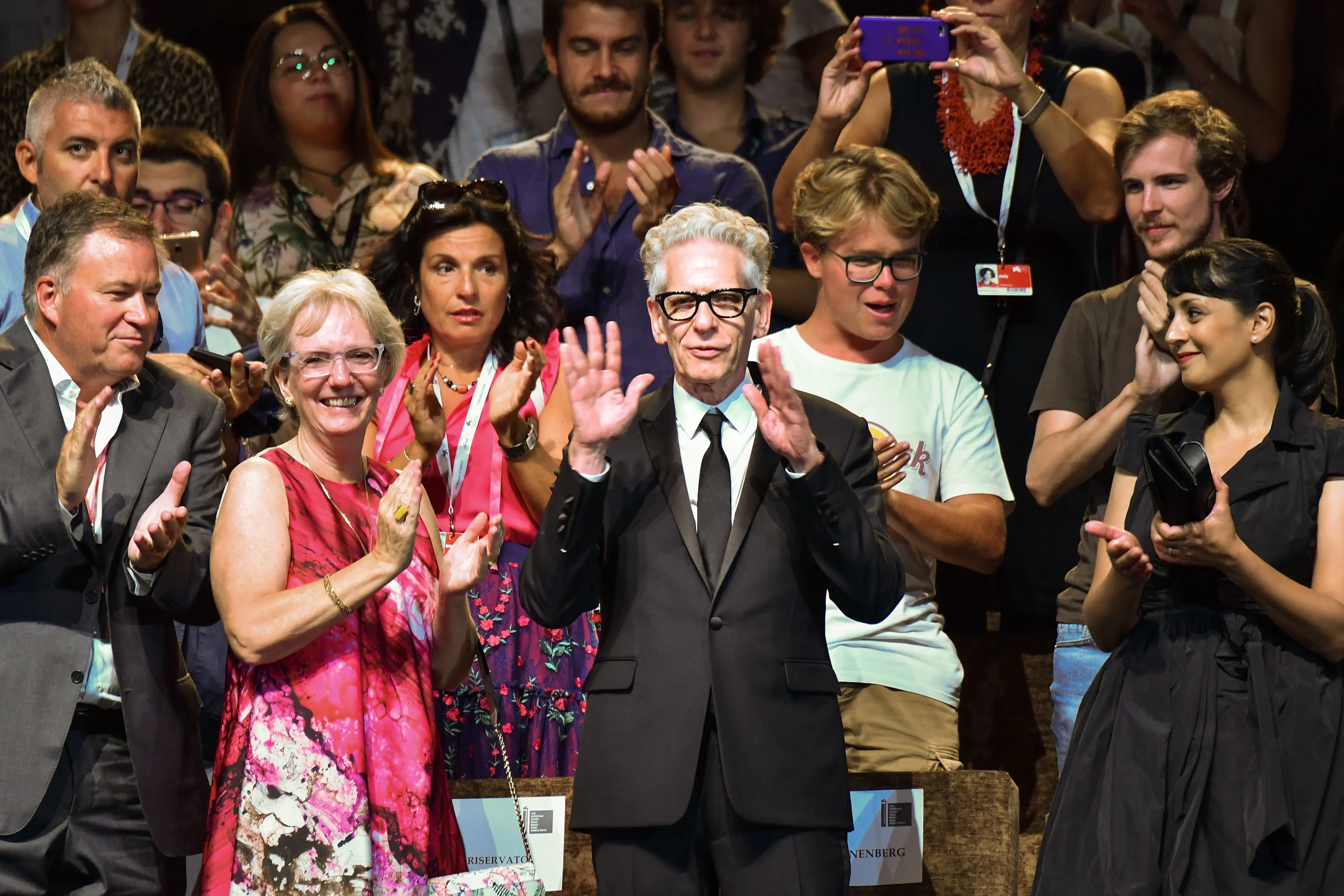 In most cases the applause is for specific members of the cast and crew to pay tribute to their work (ALBERTO PIZZOLI via Getty Images)