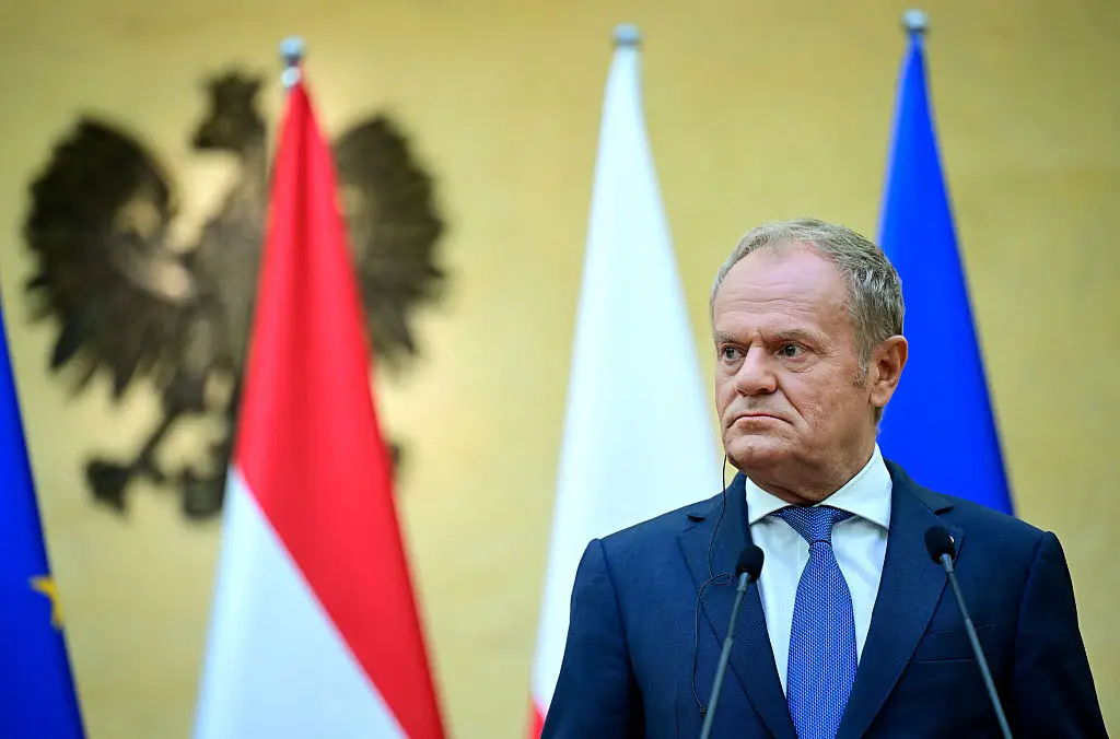 Donald Tusk of Poland has warned Russia could 'accidentally' launch drone strikes on a NATO country in the coming months (ROLAND SCHLAGER / APA / AFP via Getty Images)