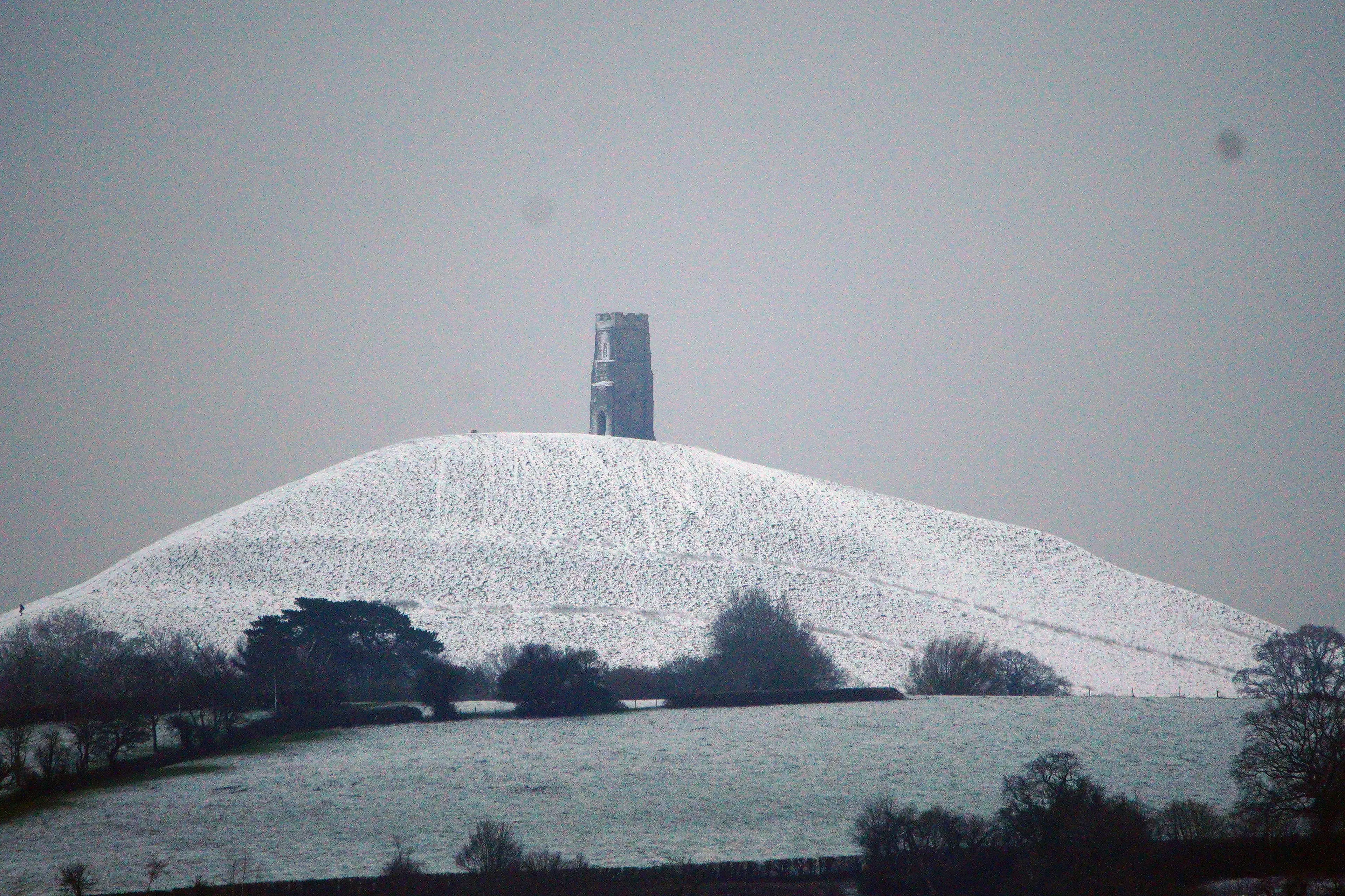 Snow surrounding Glastonbury Tor in Somerset in the early hours of today.
