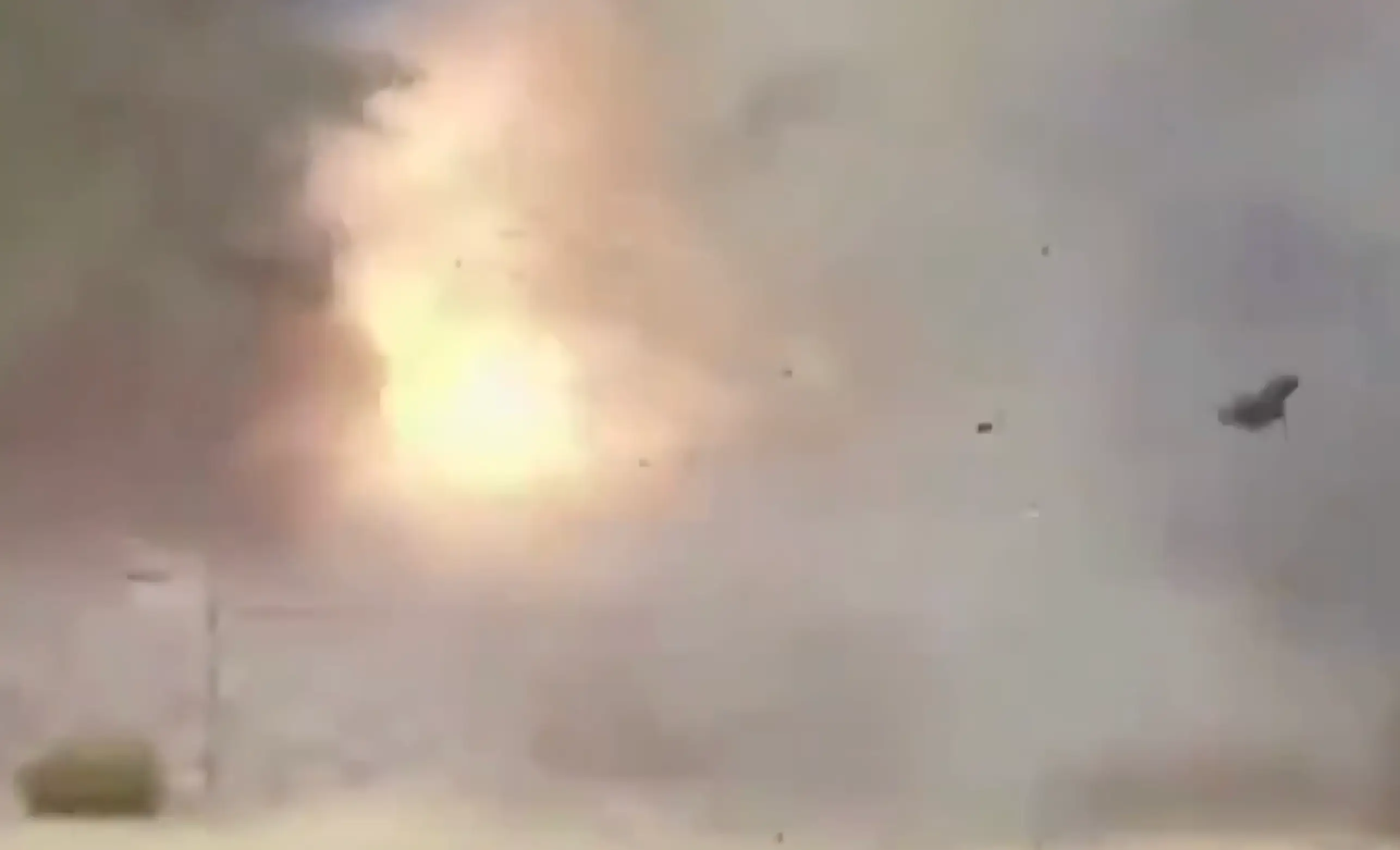 Debris can be seen flying around following the explosions (X/sentdefender)