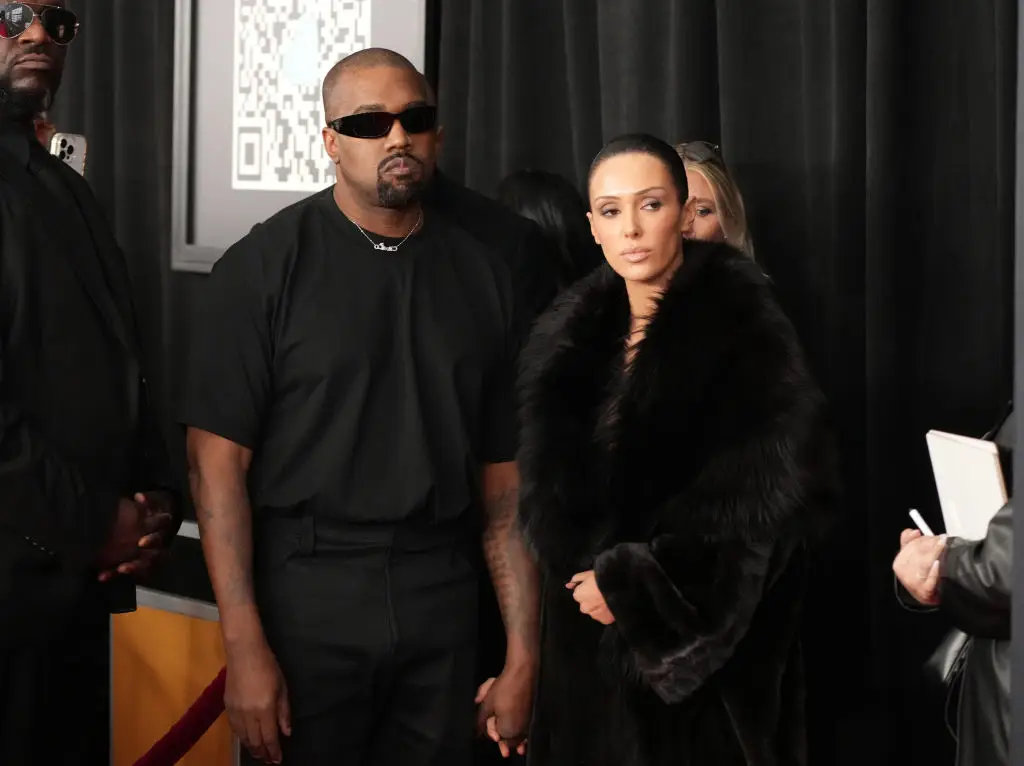 A lip reader said that Kayne West told Bianca Censori 'you're making a scene now' as they arrived at the Grammys. She certainly ended up doing that. (Jeff Kravitz/FilmMagic)