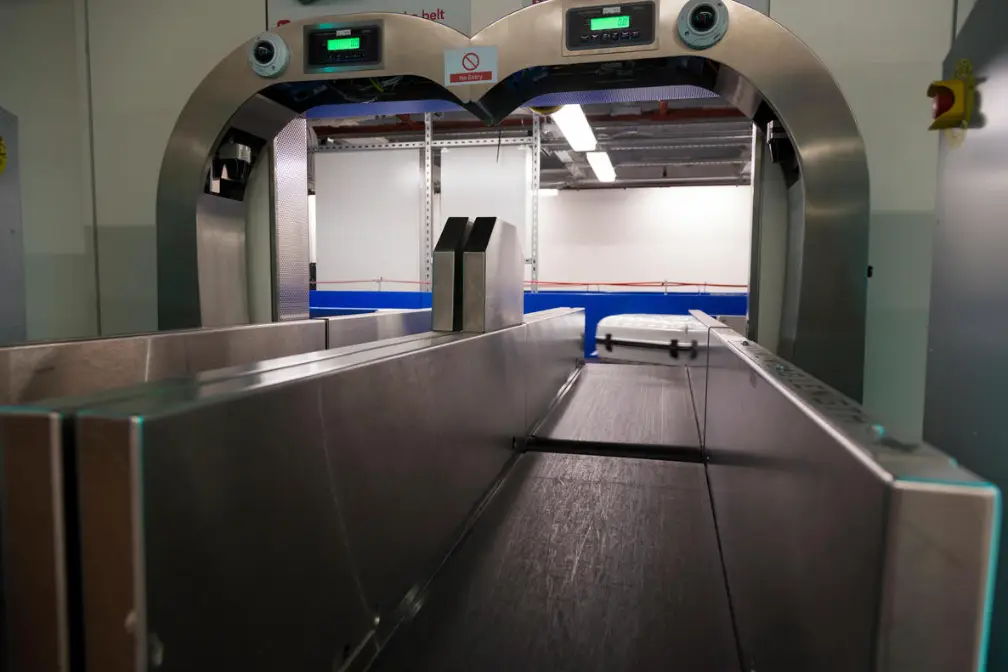 Bags typically belong on here, but one passenger was told to step on the airport scales.