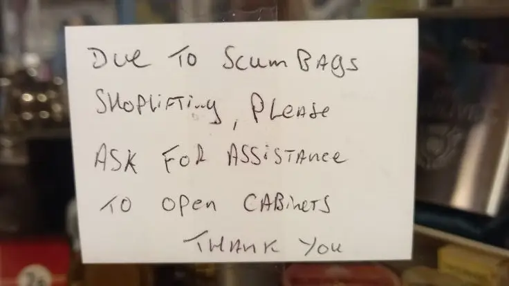 Shopkeeper stunned after police tell him to change 'offensive' 'scumbag' sign