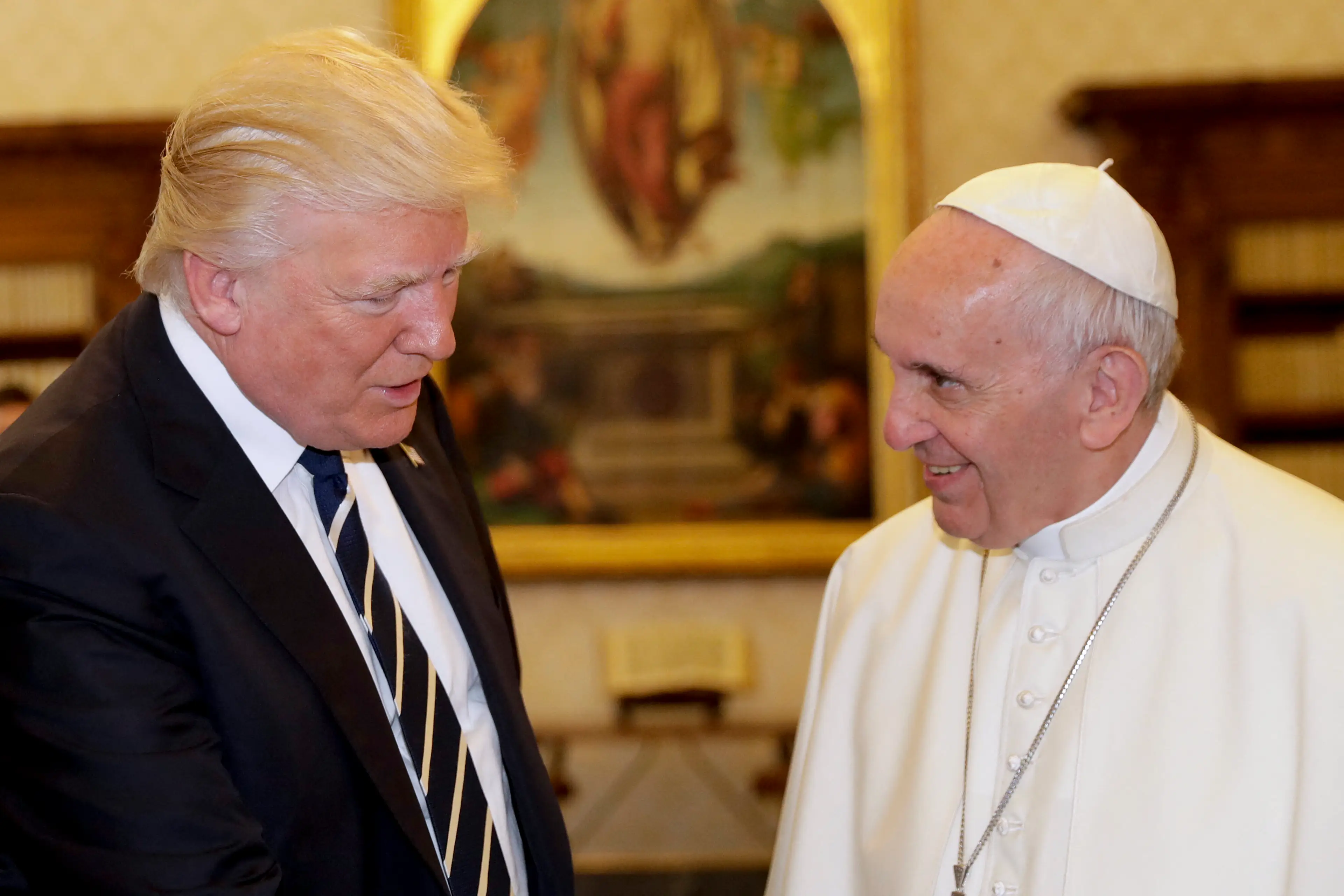 Donald Trump, pictured with Pope Francis in 2017, reckons he knows the ideal candidate to lead the Catholic Church (ALESSANDRA TARANTINO/POOL/AFP via Getty Images)