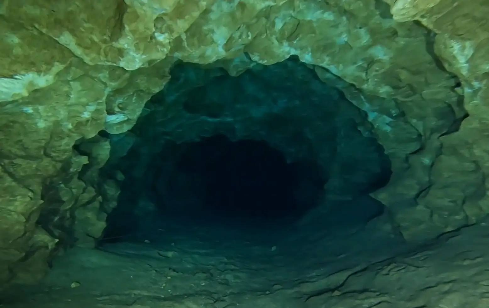 The cave system is popular with divers despite warnings about tight passages and low visibility (YouTube/ScubaCanoe)