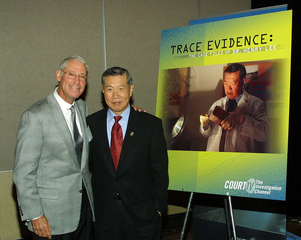 Henry Lee, right, pictured in 2004, made a career as a celebrity criminologist (Frederick M. Brown/Getty Images)