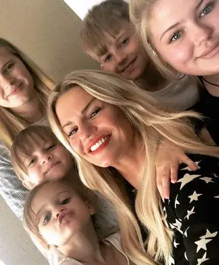 Kerry has five children and revealed she won't get the surgery to serve as a reminder to her kids the damage drugs can do. (Instagram/@kerrykatona7)