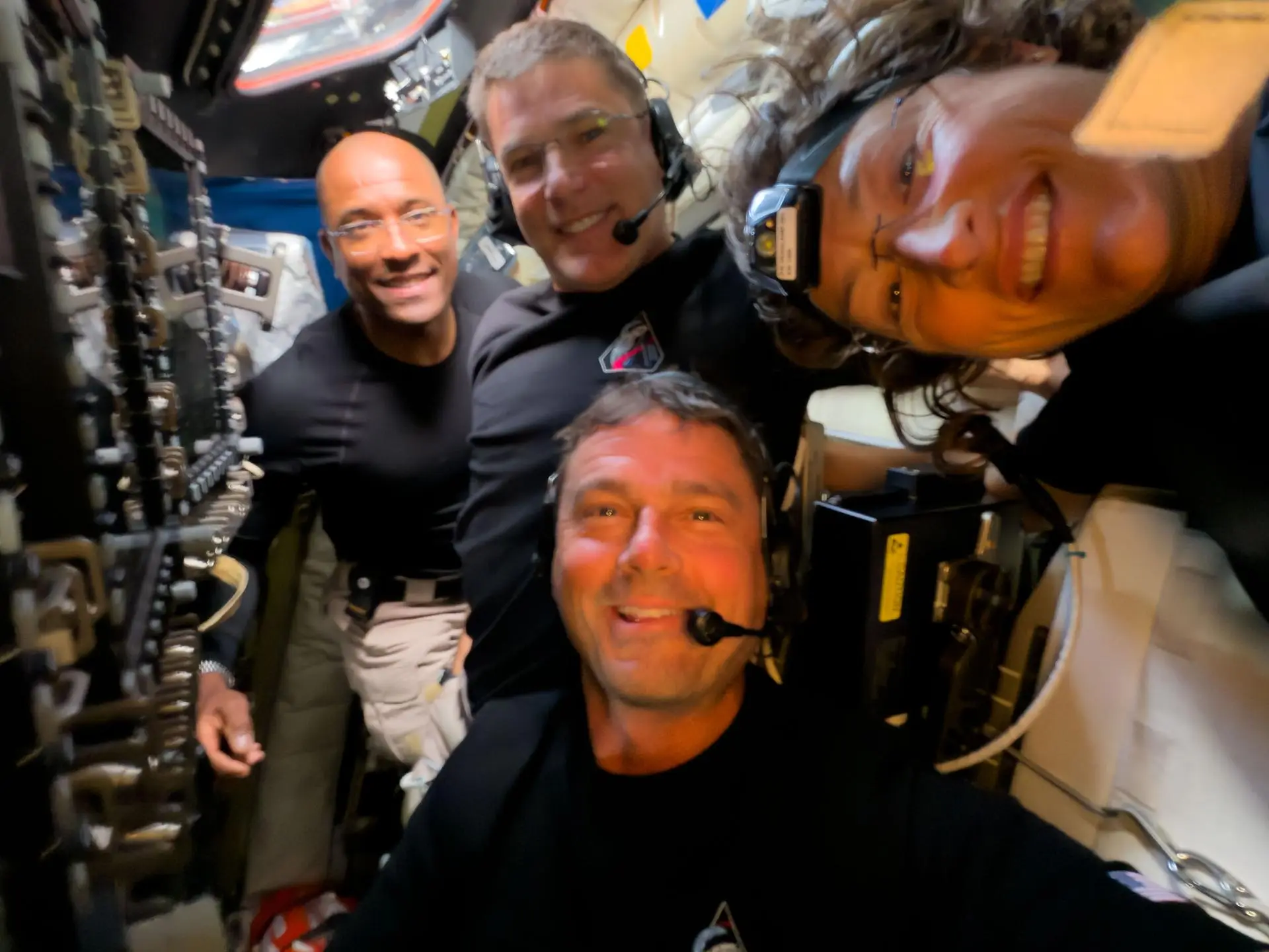 Midway through their lunar observation period, the crew stopped for a quick snap (NASA)