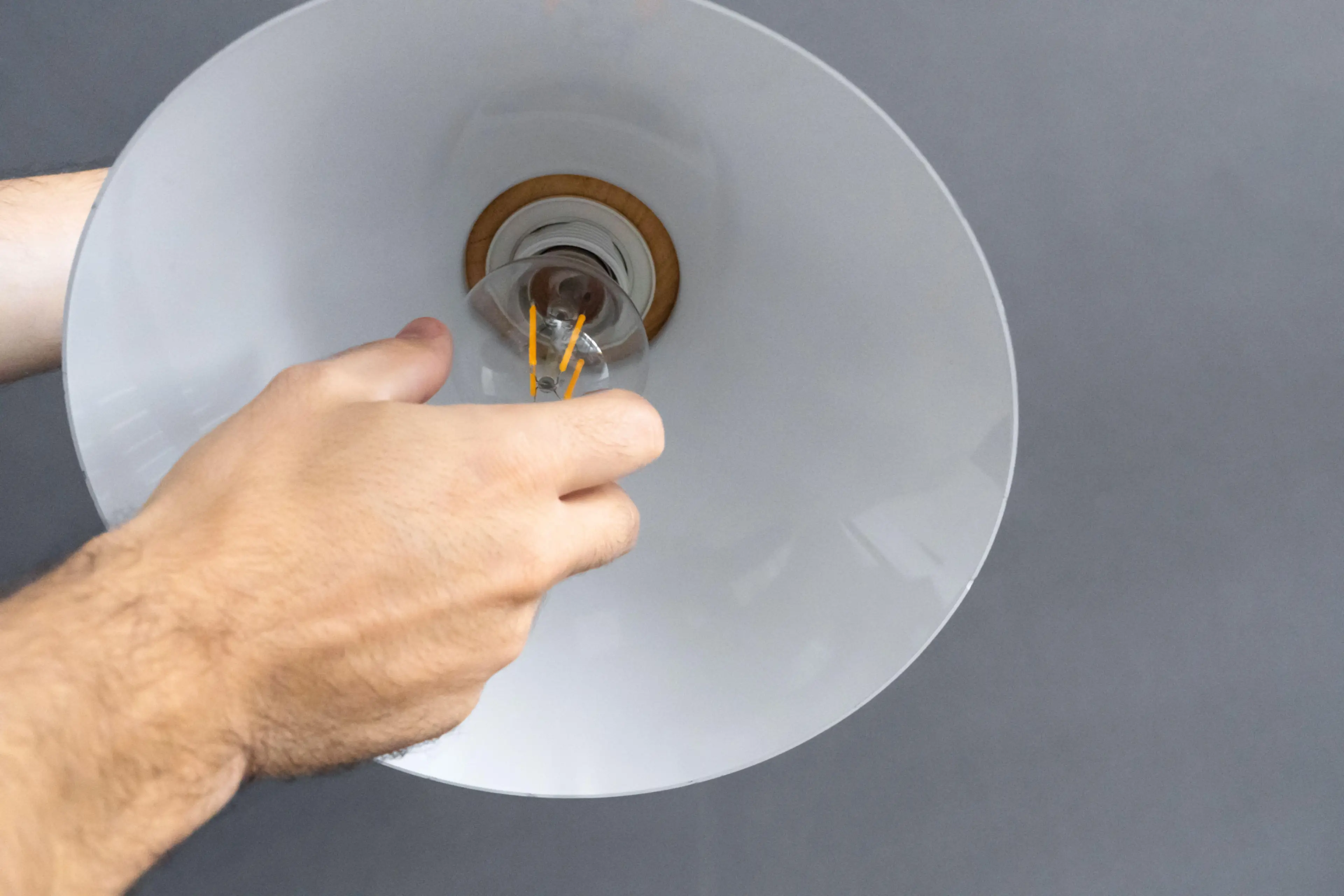 Martin only uses one lightbulb.