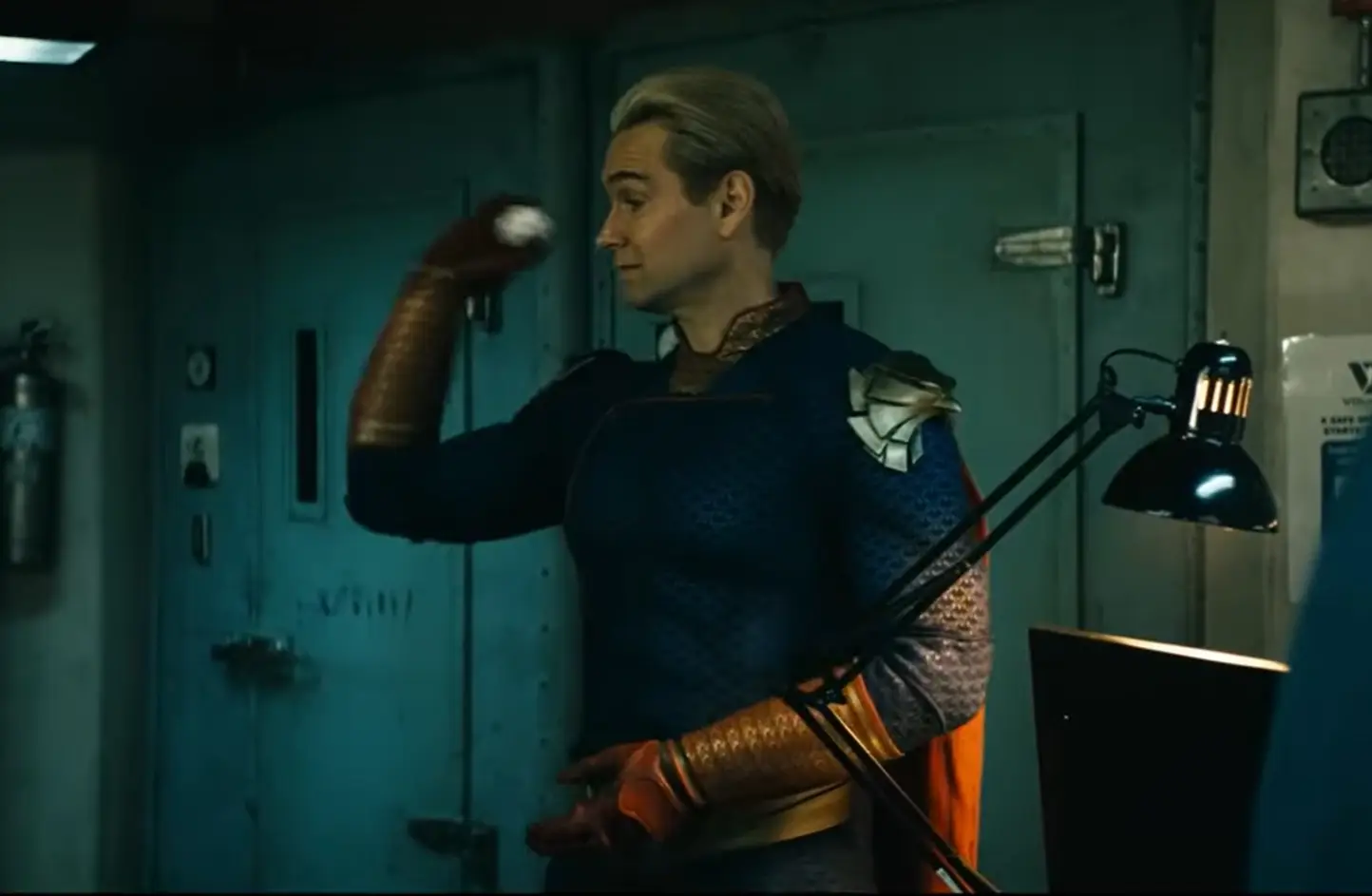 Homelander came to visit these busy scientists and play games with them, what an inspiring hero! (Prime Video)  