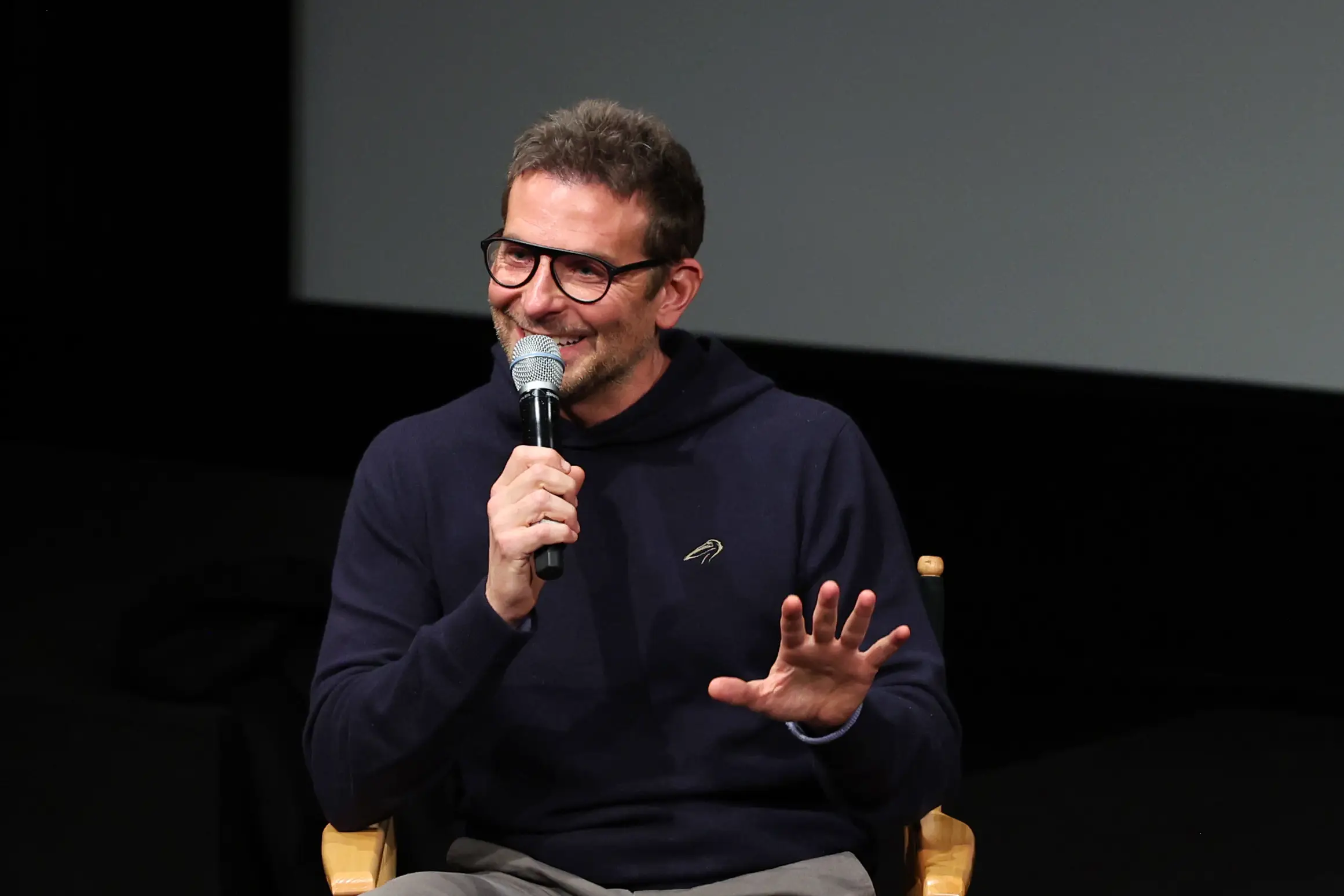 Bradley Cooper said he thinks people's 'energy dips' when they have chairs on set.