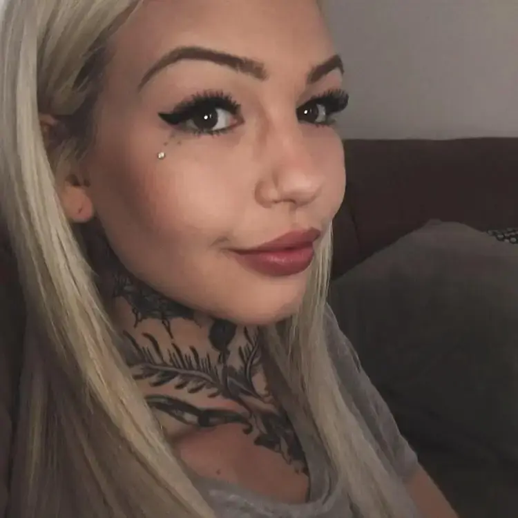 Amber shared an image of what she looked like before the tattoos (Instagram/@amberluke666)