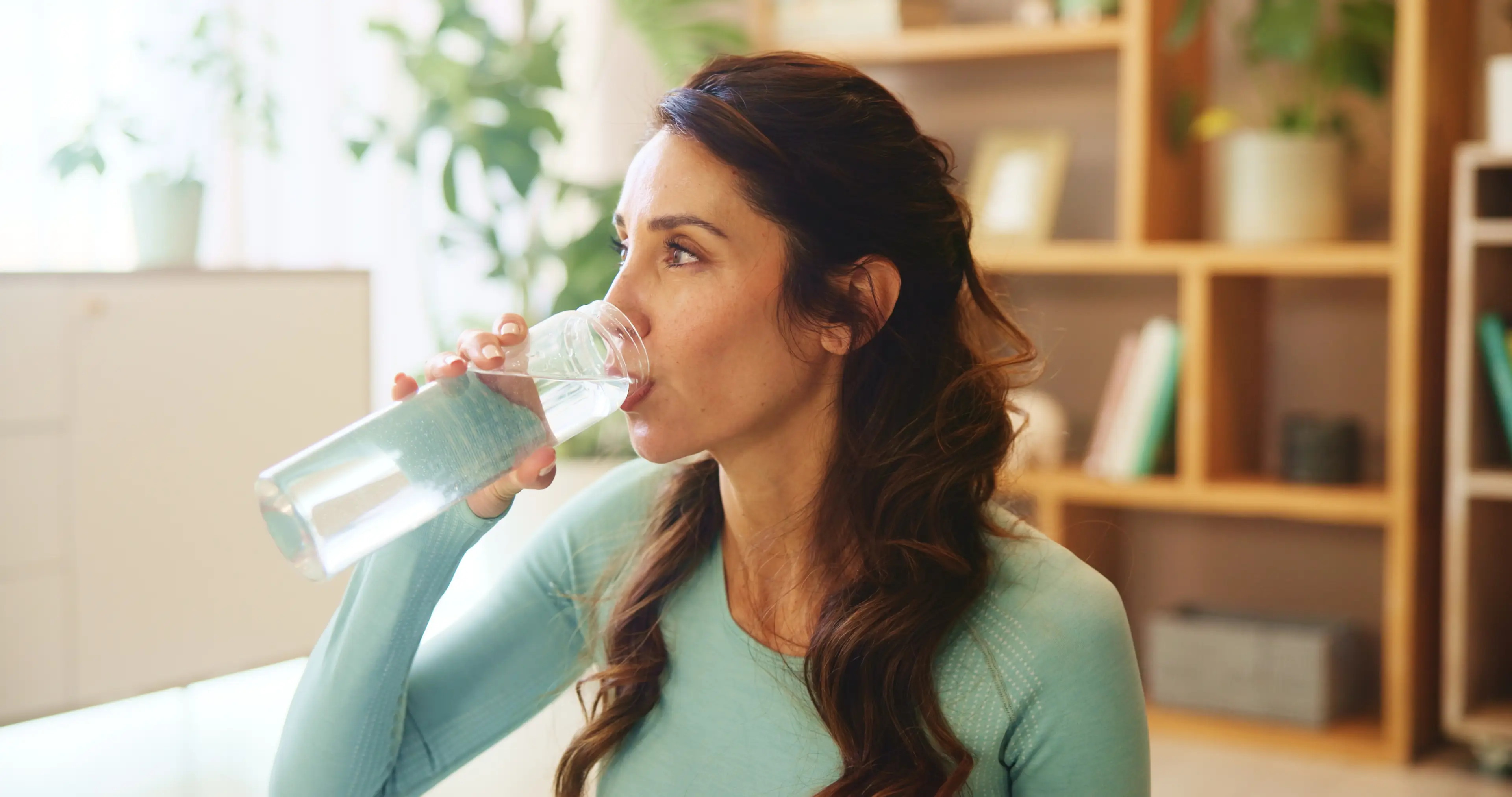 A doctor recommends you try electrolyte water instead if you want to dull the pain of a migraine (Getty Stock Photo)